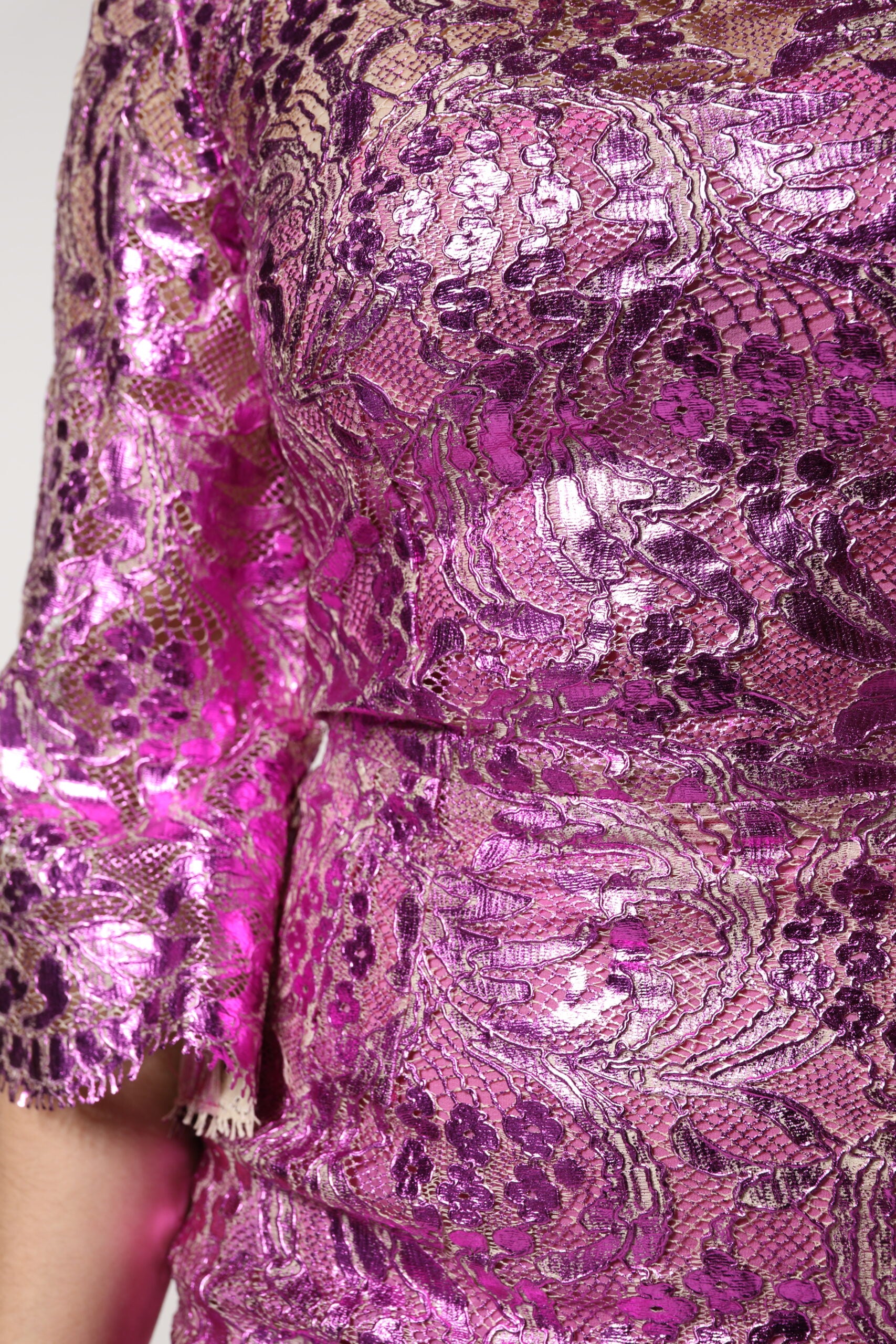 Indulge in the Dolce & Gabbana Metallic Fuchsia Floral Sheath Mini Dress, a masterpiece of Italian craftsmanship that embodies timeless elegance and modern femininity.