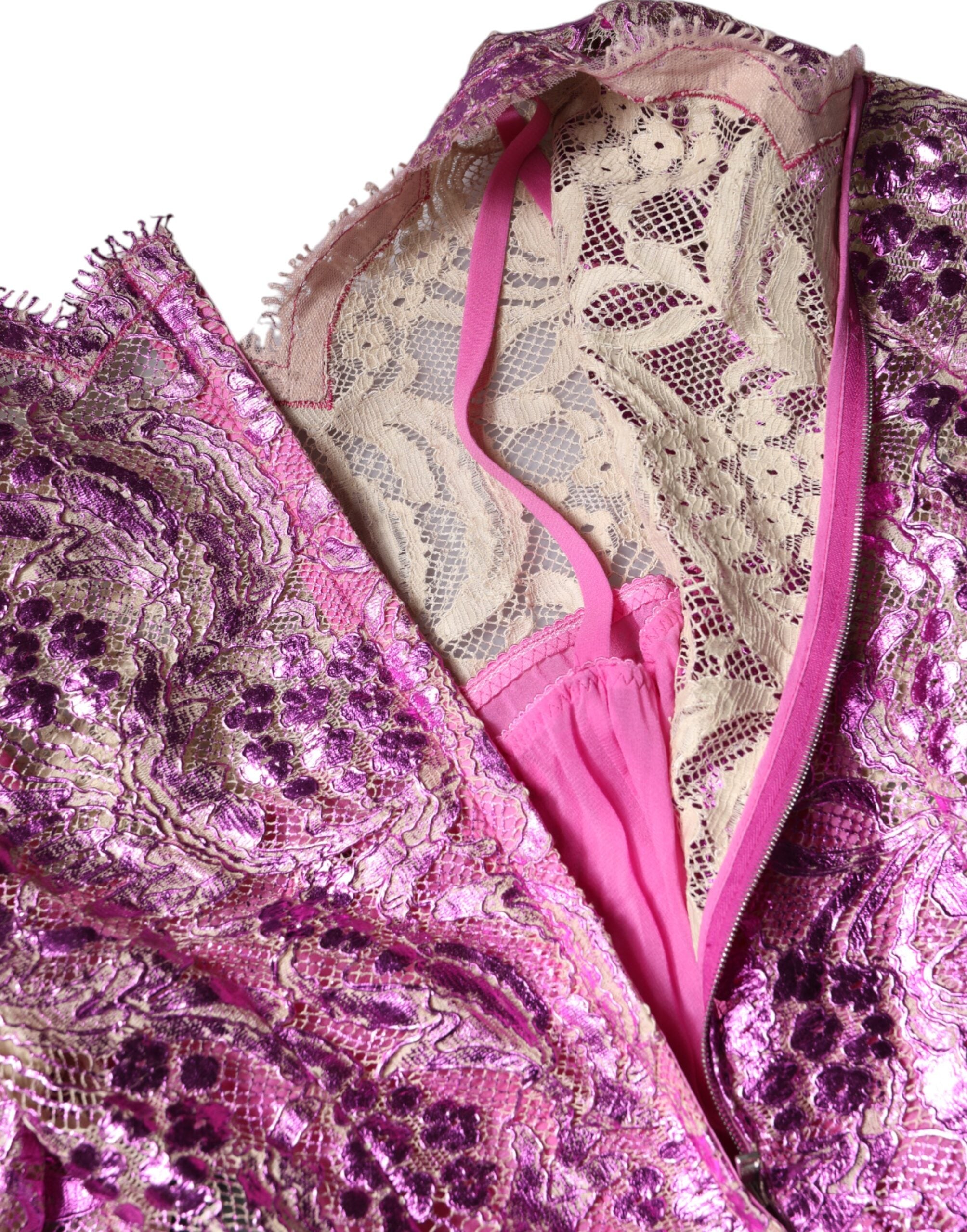Experience the allure of the Dolce & Gabbana Metallic Fuchsia Floral Sheath Mini Dress, where exquisite craftsmanship meets timeless elegance, perfect for the discerning individual.