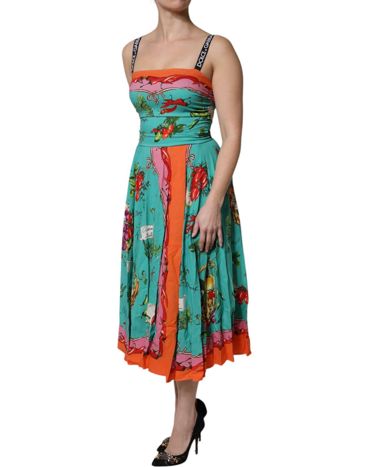Elevate your wardrobe with the Dolce & Gabbana Multicolor Printed Silk Sleeveless Midi Dress, a masterpiece of Italian craftsmanship that embodies sophistication and allure.