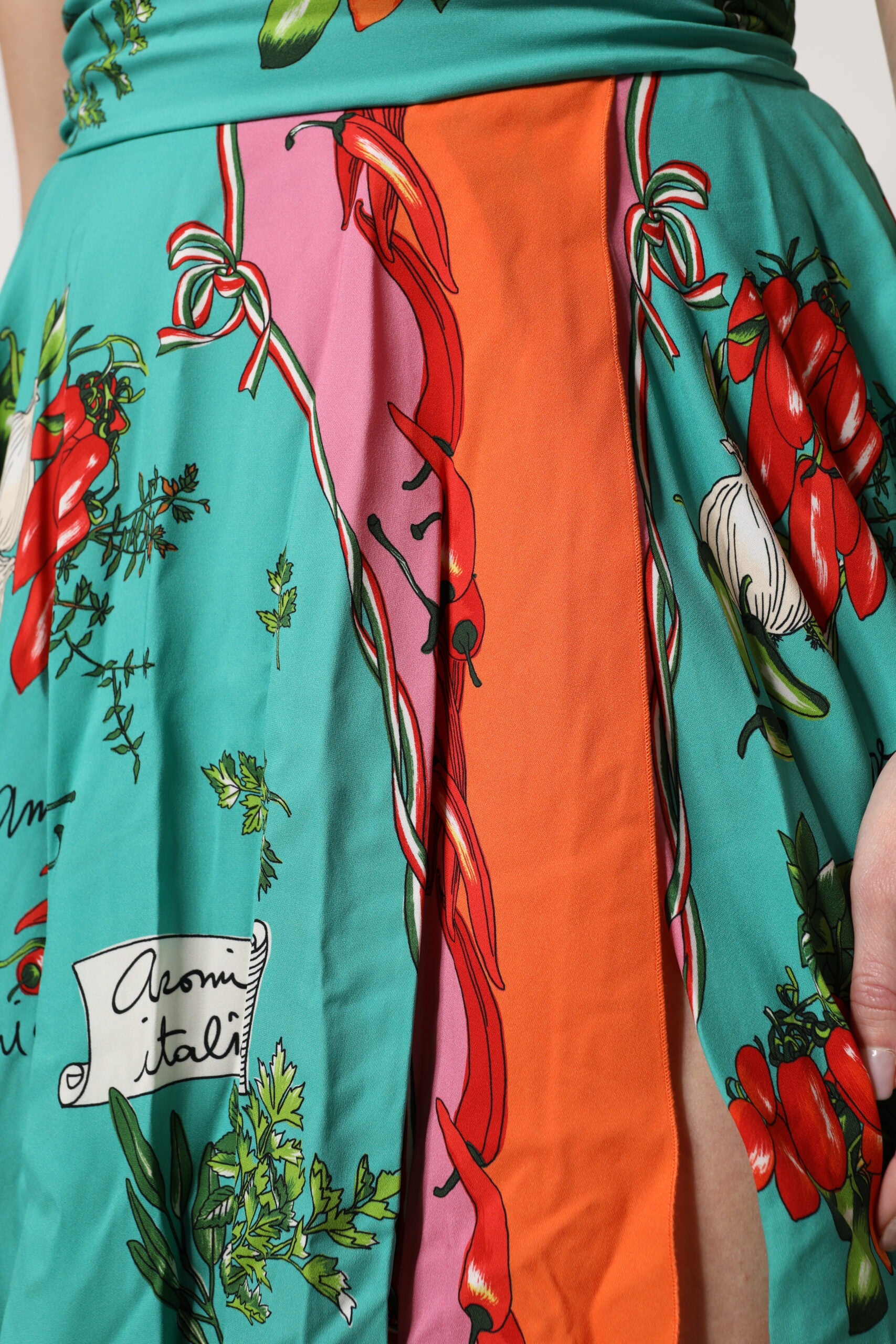 Elevate your wardrobe with the Dolce & Gabbana Multicolor Printed Silk Sleeveless Midi Dress, a masterpiece of Italian craftsmanship that embodies timeless elegance and individuality.