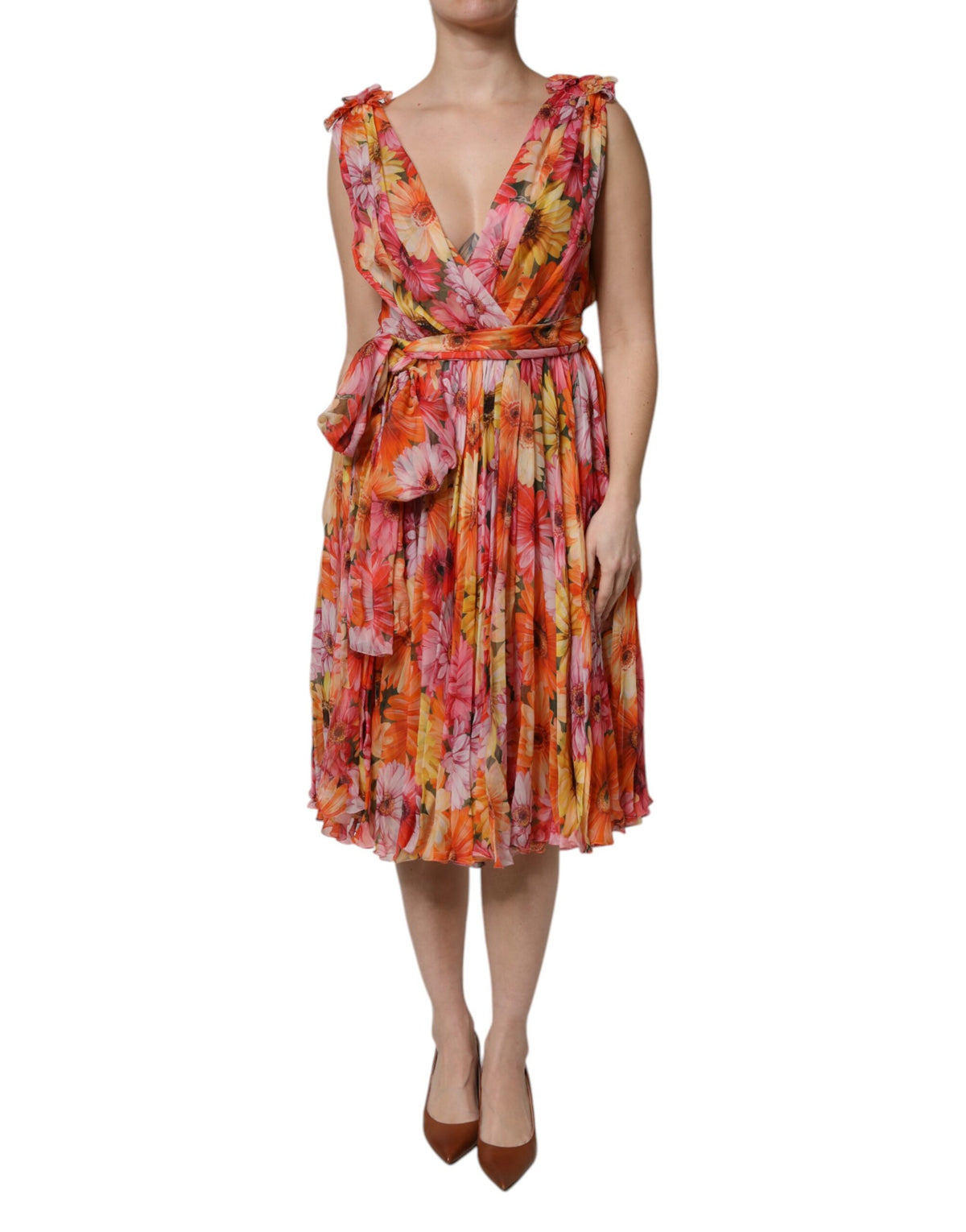 Discover the Dolce & Gabbana Multicolor Floral Silk V-neck Chiffon Dress, a masterpiece of Italian craftsmanship that embodies luxury and elegance for unforgettable moments.