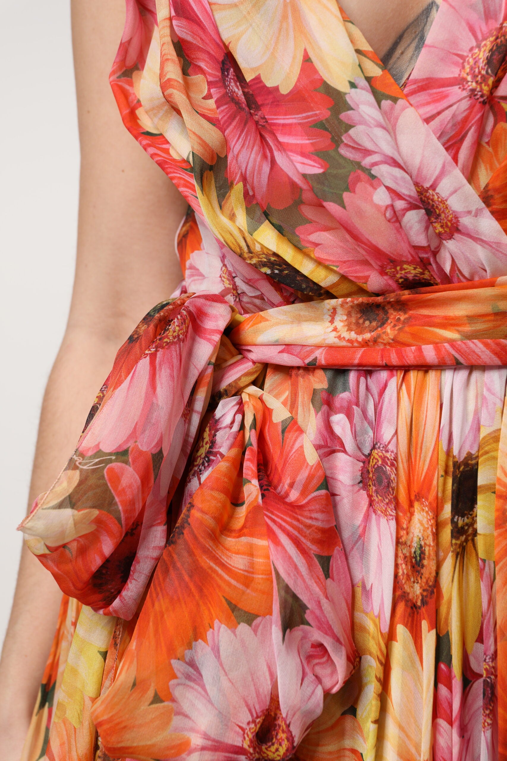 Discover the exquisite Dolce & Gabbana Multicolor Floral Silk V-neck Chiffon Dress, a luxurious blend of silk and artistry, perfect for unforgettable moments of elegance.