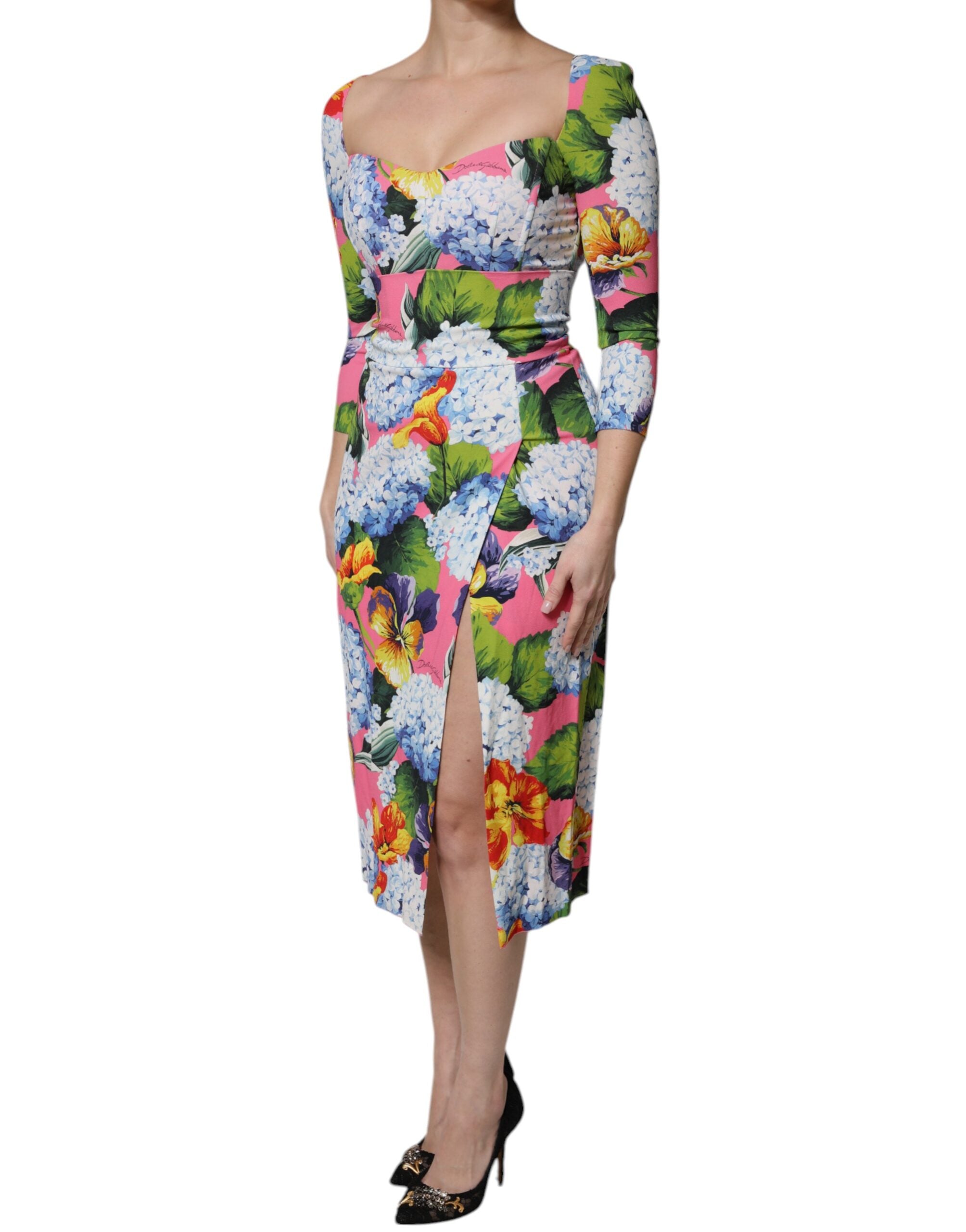 Experience the allure of the Dolce & Gabbana Multicolor Floral Side Slit Midi Dress, a luxurious blend of viscose and elastane, crafted in Italy for timeless elegance.