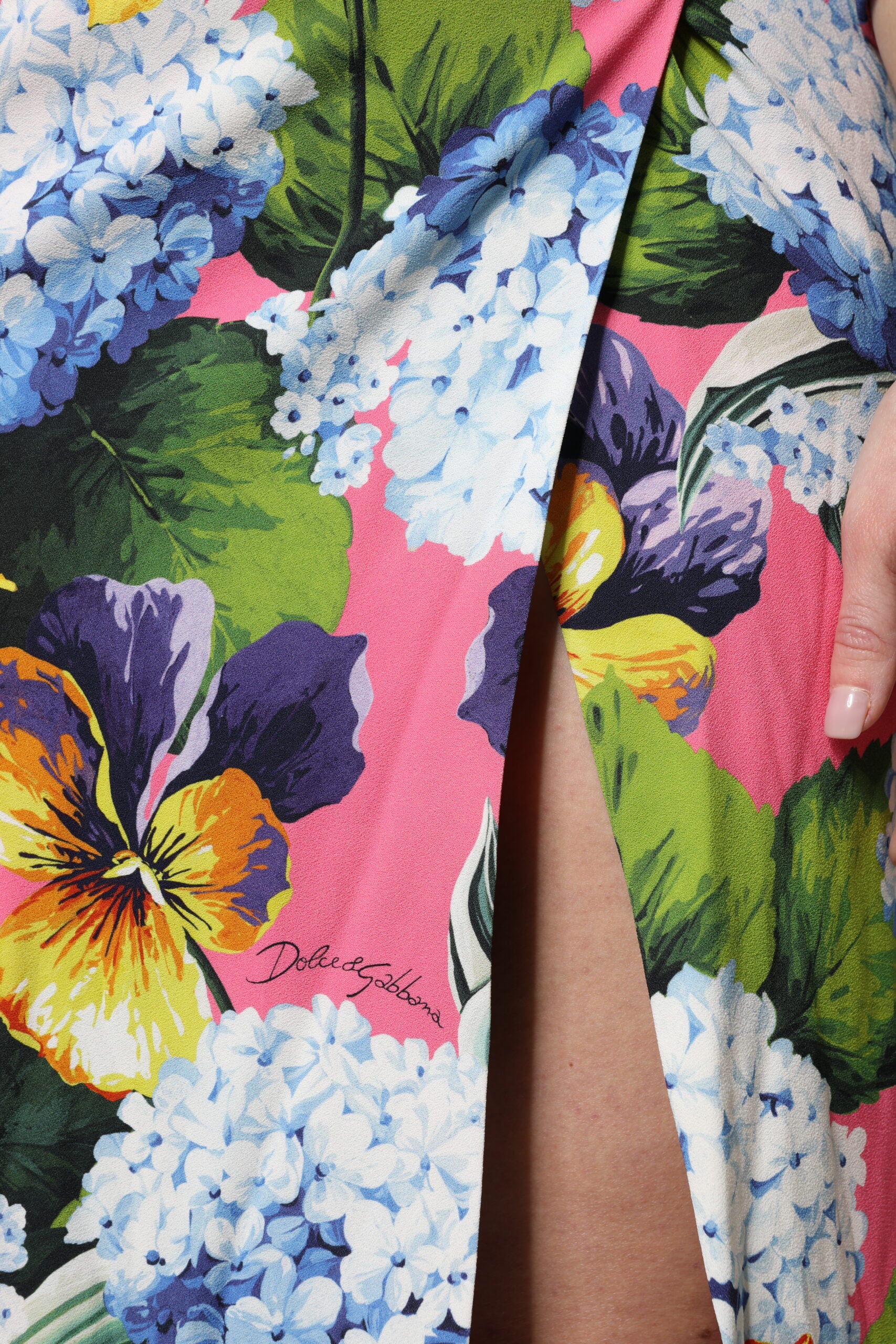 Experience the allure of the Dolce & Gabbana Multicolor Floral Side Slit Midi Dress, a luxurious blend of viscose and elastane, crafted for timeless elegance and sophistication.