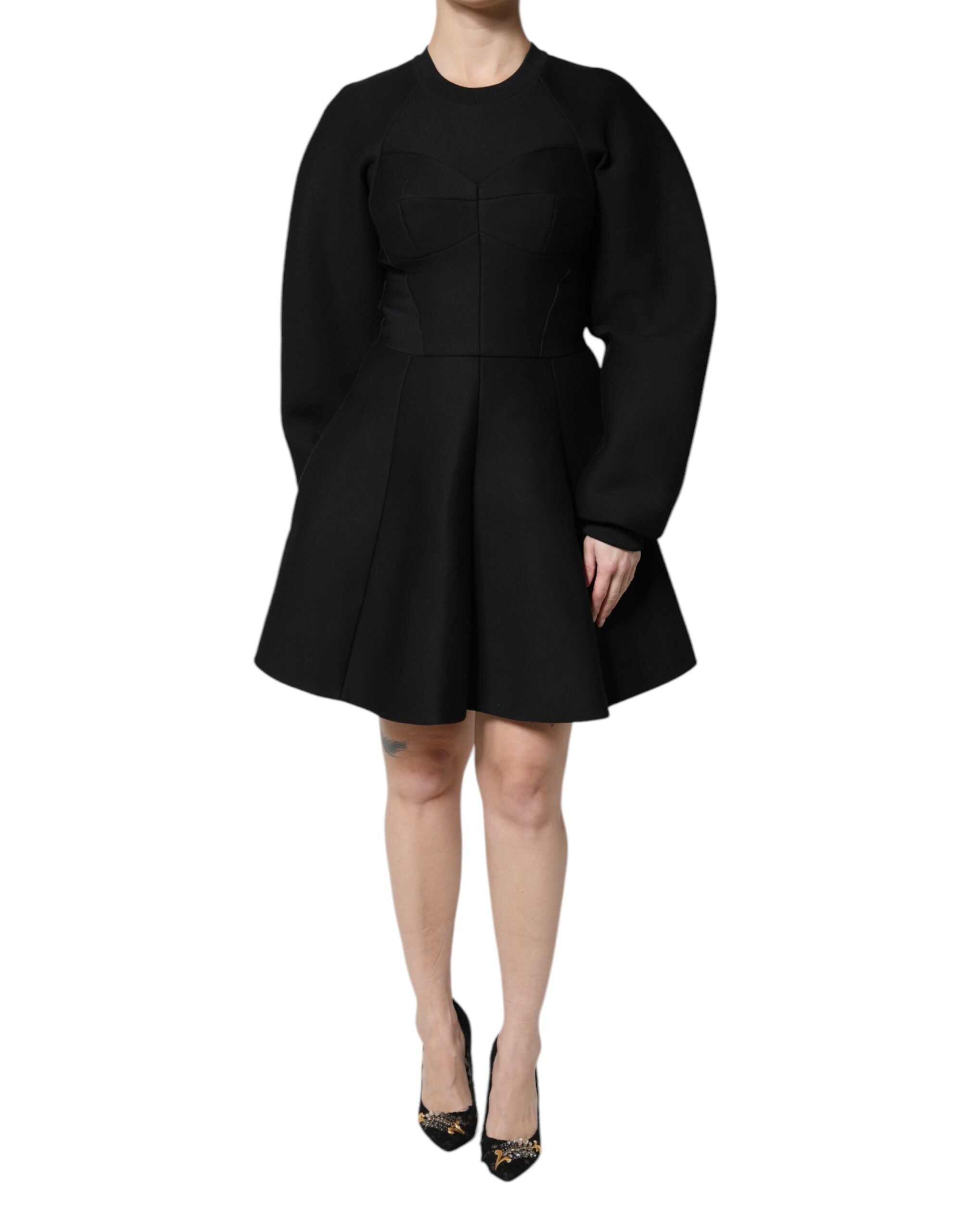 Elevate your elegance with the Dolce & Gabbana Black Cotton Long Sleeves A-line Mini Dress, a masterpiece of Italian craftsmanship that embodies luxurious sophistication.