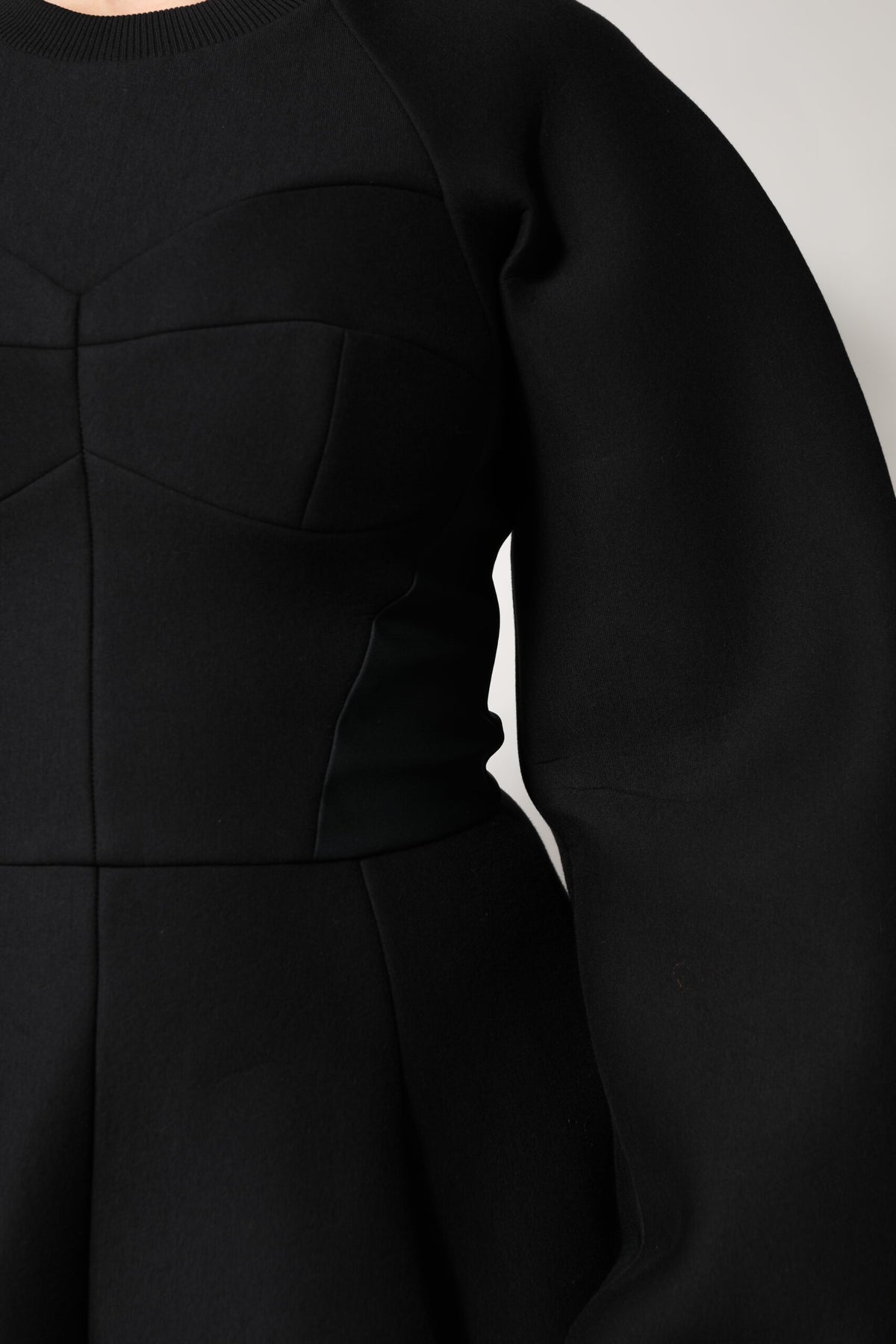 Discover the exquisite Dolce & Gabbana Black Cotton Long Sleeves A-line Mini Dress, a testament to Italian craftsmanship that embodies elegance and sophistication for any occasion.