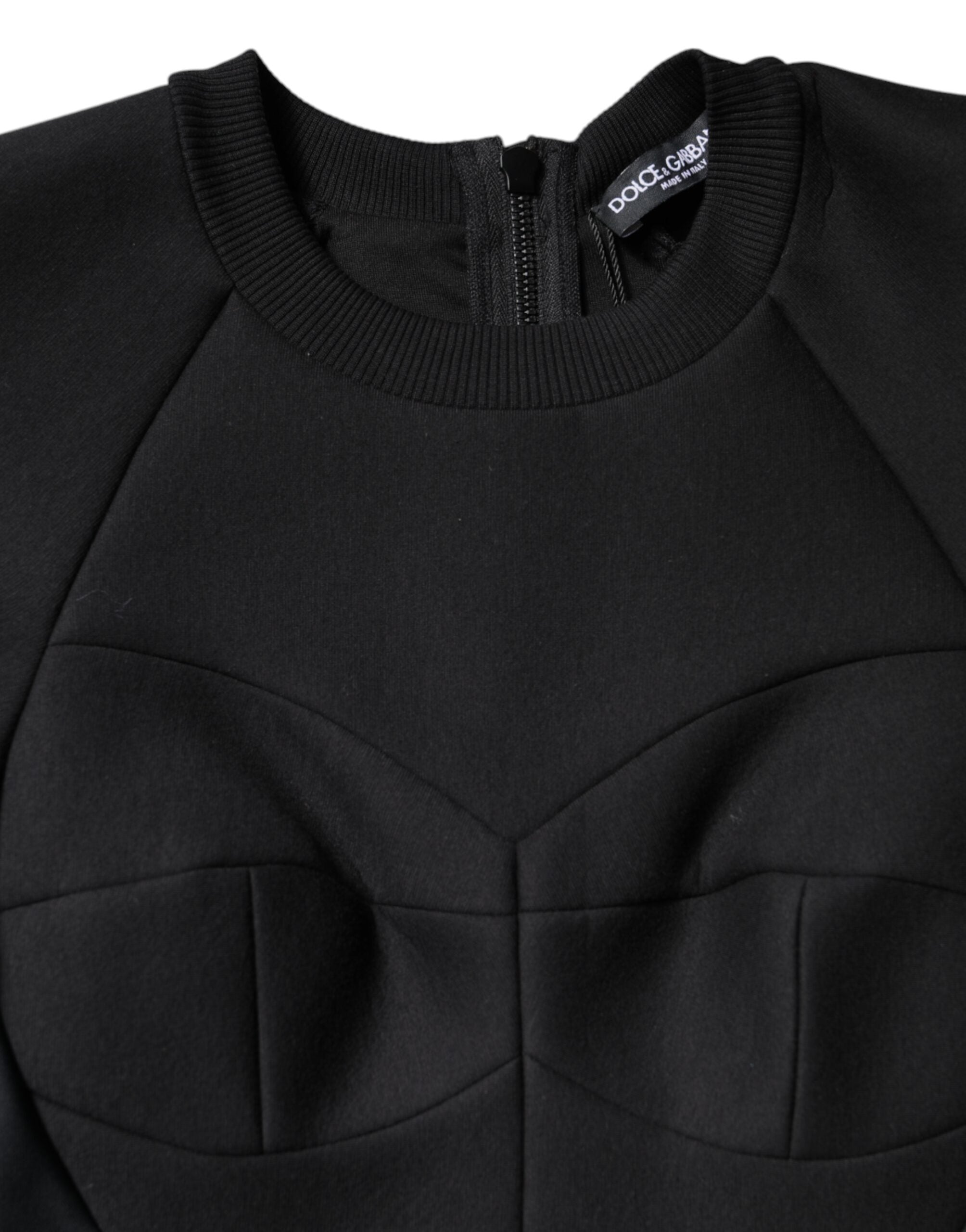 Elevate your elegance with the Dolce & Gabbana Black Cotton Long Sleeves A-line Mini Dress, a masterpiece of Italian craftsmanship that embodies luxury and sophistication.