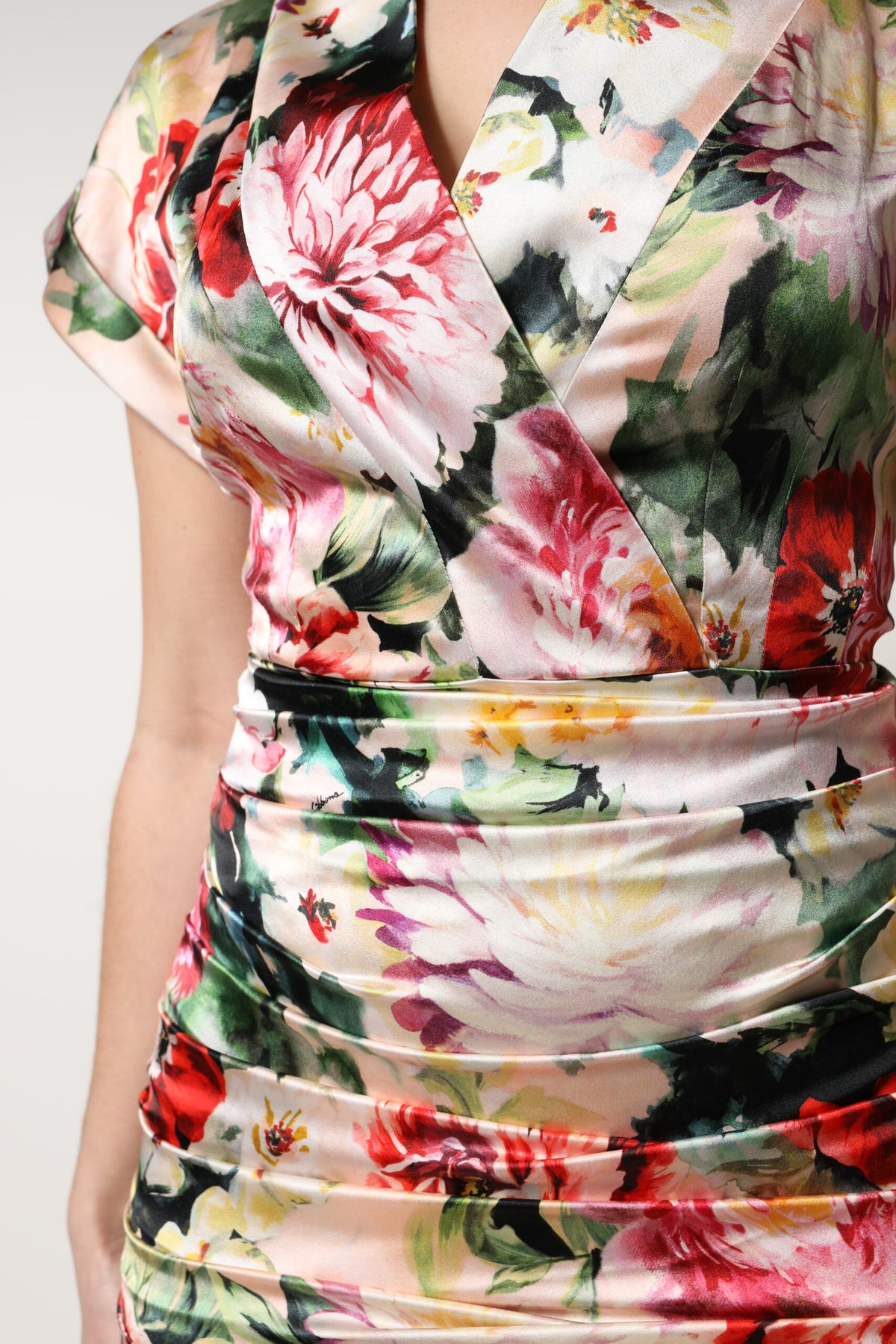 Indulge in the exquisite Dolce & Gabbana Multicolor Floral Short Sleeves Sheath Midi Dress, where luxurious silk meets captivating artistry for timeless elegance.