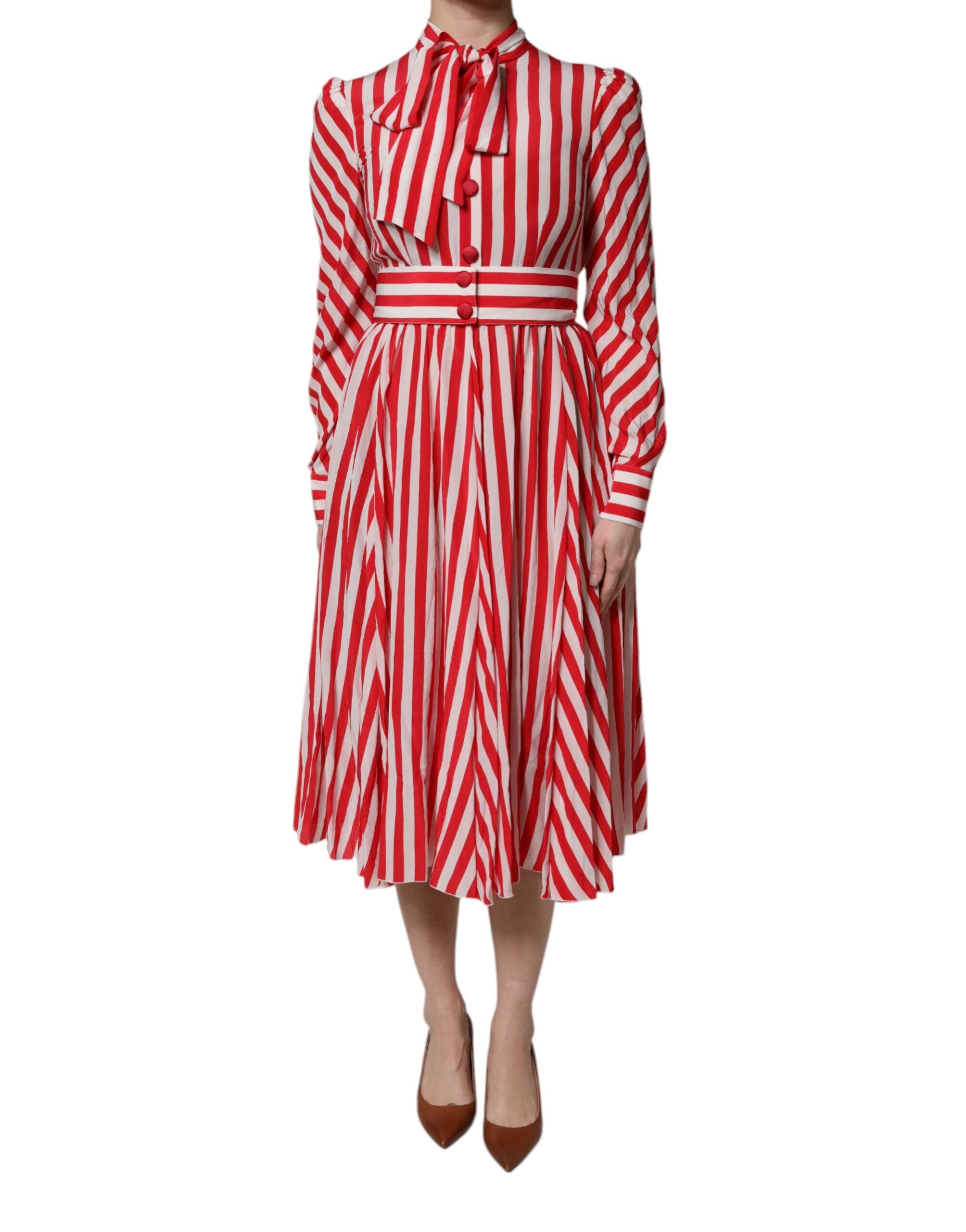 Indulge in the exquisite elegance of the Dolce & Gabbana White Red Stripes Long Sleeves Midi Dress, a luxurious silk masterpiece that embodies sophistication and timeless allure.