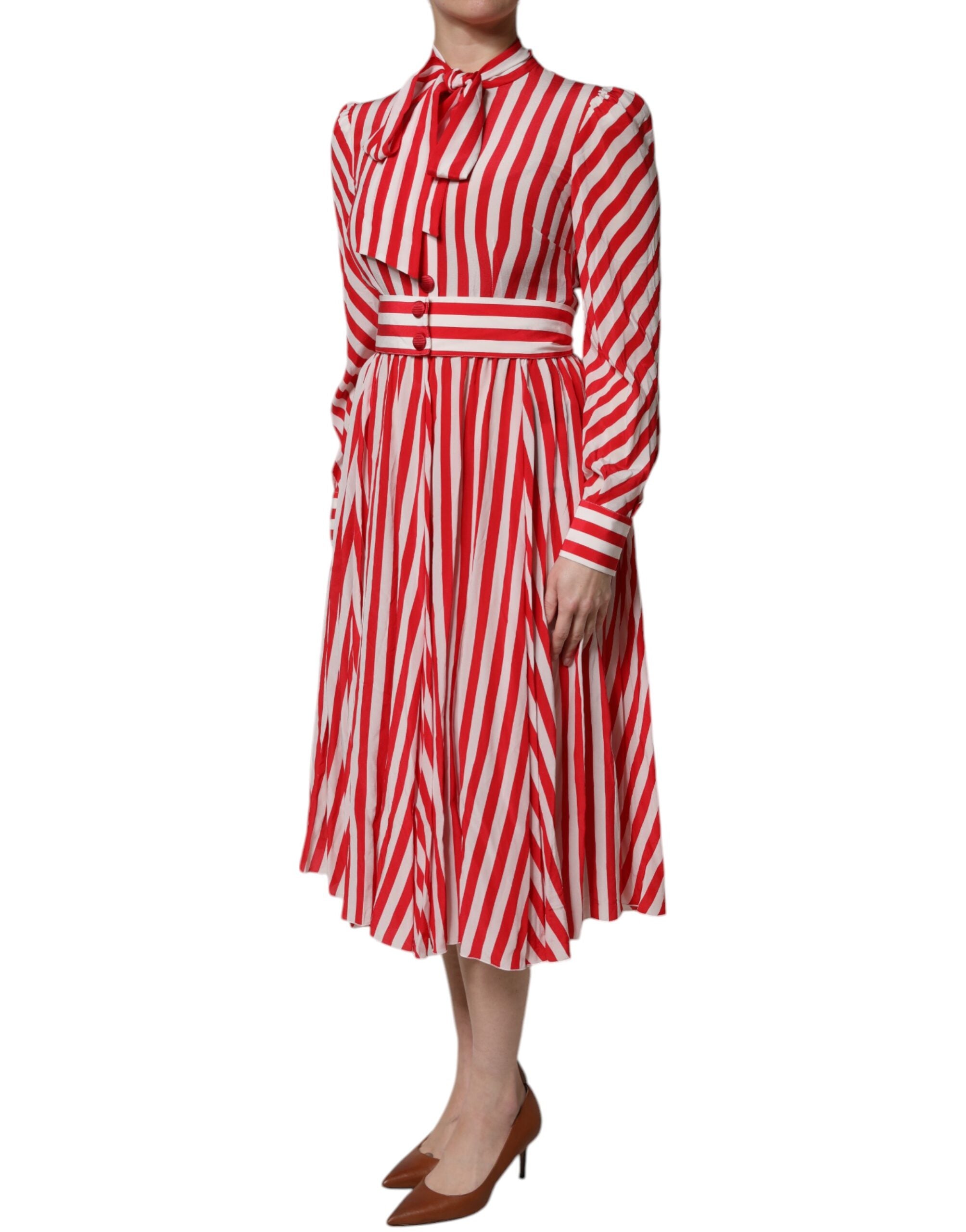 Elevate your wardrobe with the Dolce & Gabbana White Red Stripes Long Sleeves Midi Dress, a silk masterpiece that embodies exquisite craftsmanship and timeless elegance.