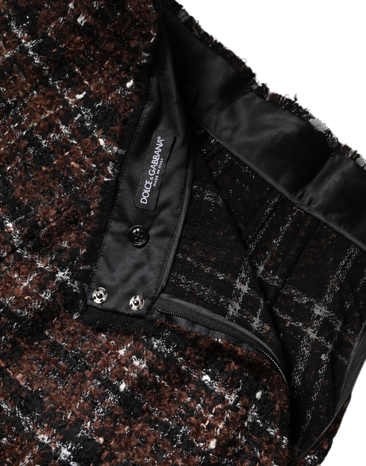 Elevate your wardrobe with the Dolce & Gabbana Multicolor High Waist Tartan Tweed Pencil Cut Skirt, a masterpiece of Italian craftsmanship and luxurious materials that embodies timeless elegance.
