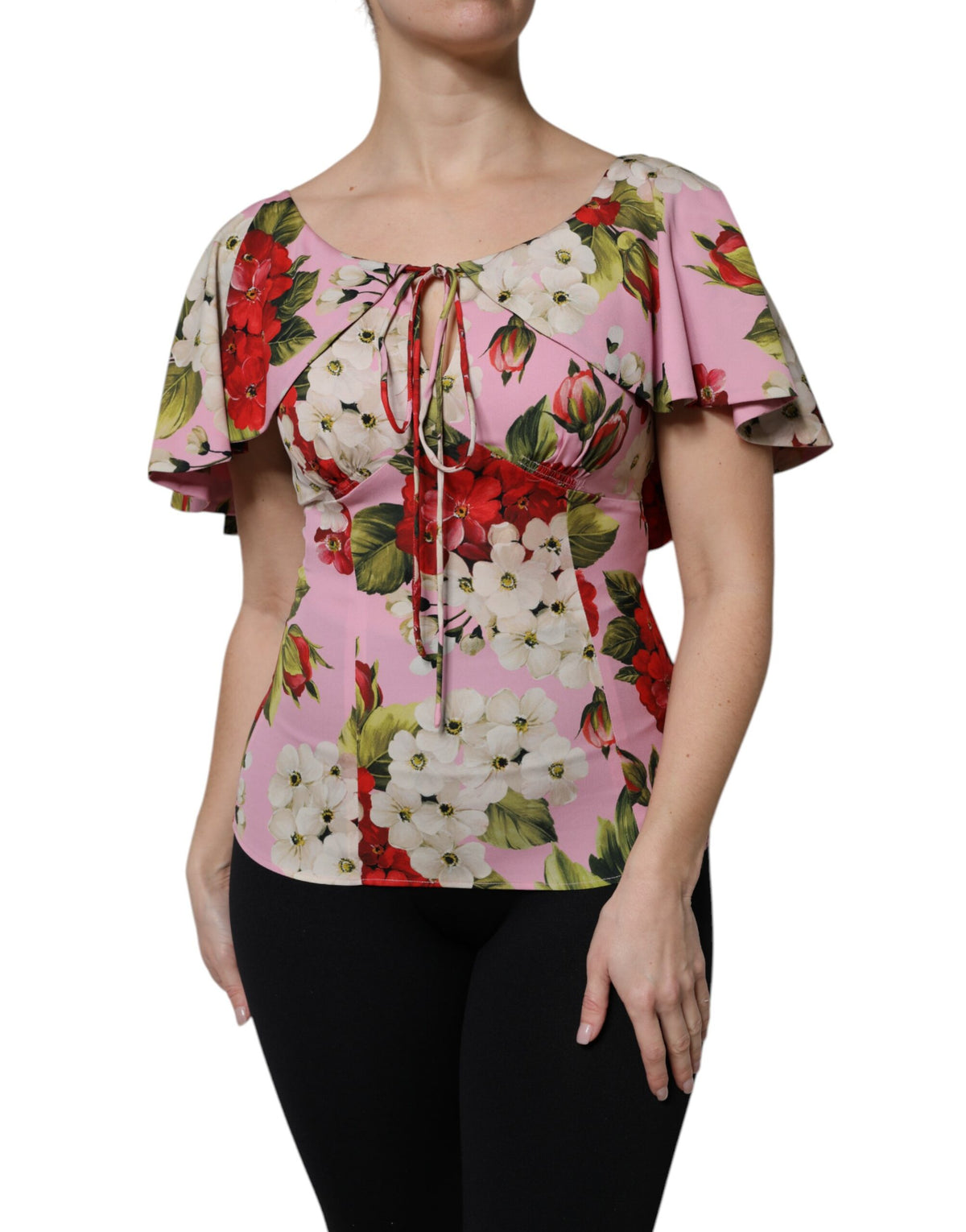 Elevate your wardrobe with the Dolce & Gabbana Pink Floral Silk Blouse, a luxurious blend of silk and elastane, embodying timeless elegance and exquisite Italian craftsmanship.