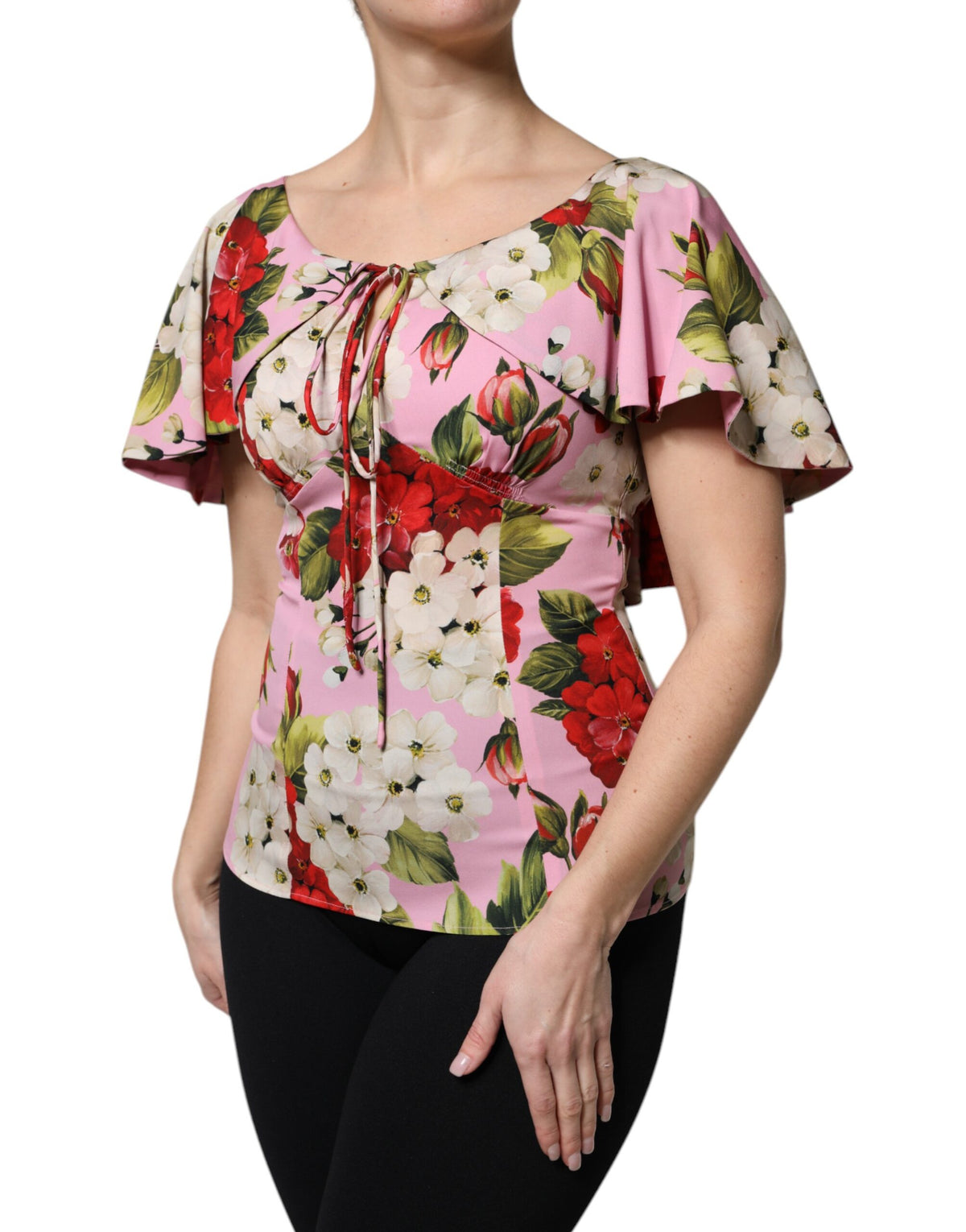 Elevate your wardrobe with the Dolce & Gabbana Pink Floral Silk Blouse, a luxurious blend of silk and elastane, embodying timeless elegance and exquisite Italian craftsmanship.