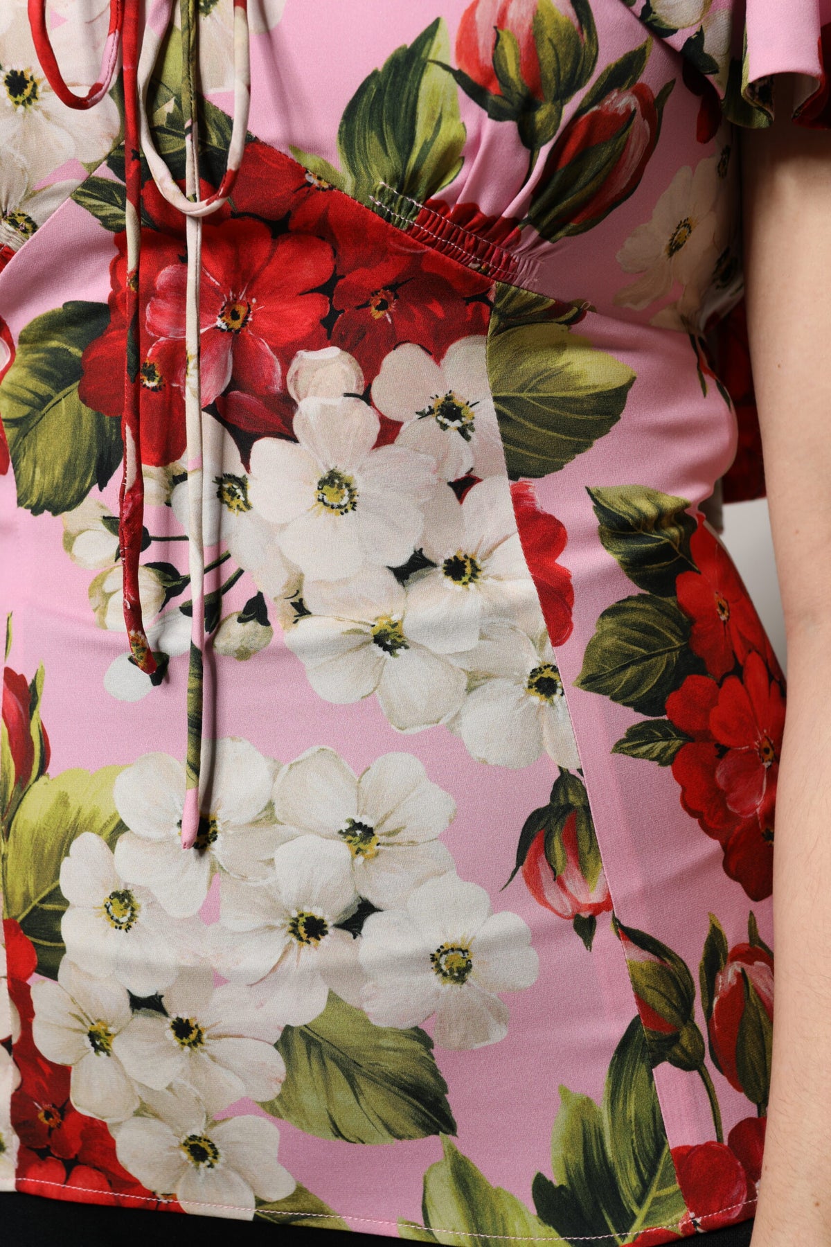 Elevate your wardrobe with the Dolce & Gabbana Pink Floral Silk Blouse, a masterpiece of Italian craftsmanship that embodies timeless elegance and luxurious femininity.
