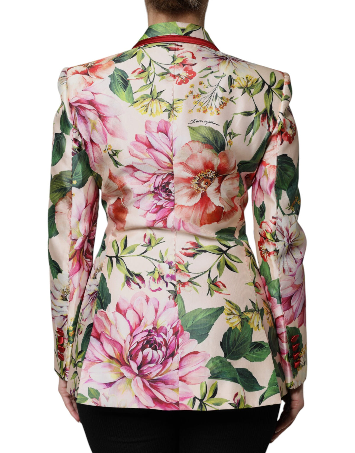 Discover the Dolce & Gabbana Multicolor Floral Double Breasted Jacket, an exquisite silk masterpiece that embodies luxury and sophistication for the discerning individual.