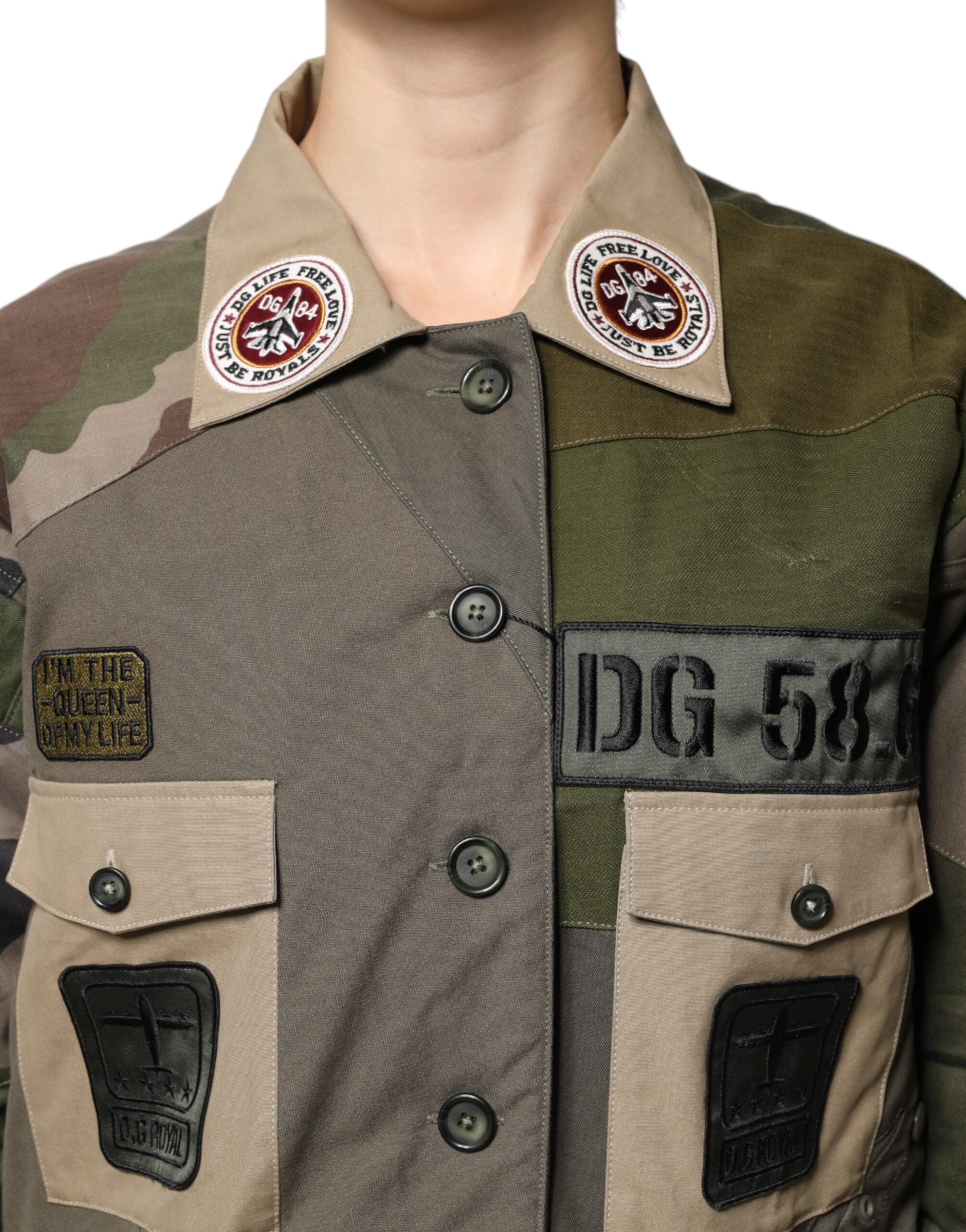 Elevate your wardrobe with the Dolce & Gabbana Military Green Cotton Button Down Jacket, a masterpiece of Italian craftsmanship that embodies timeless luxury and sophisticated style.