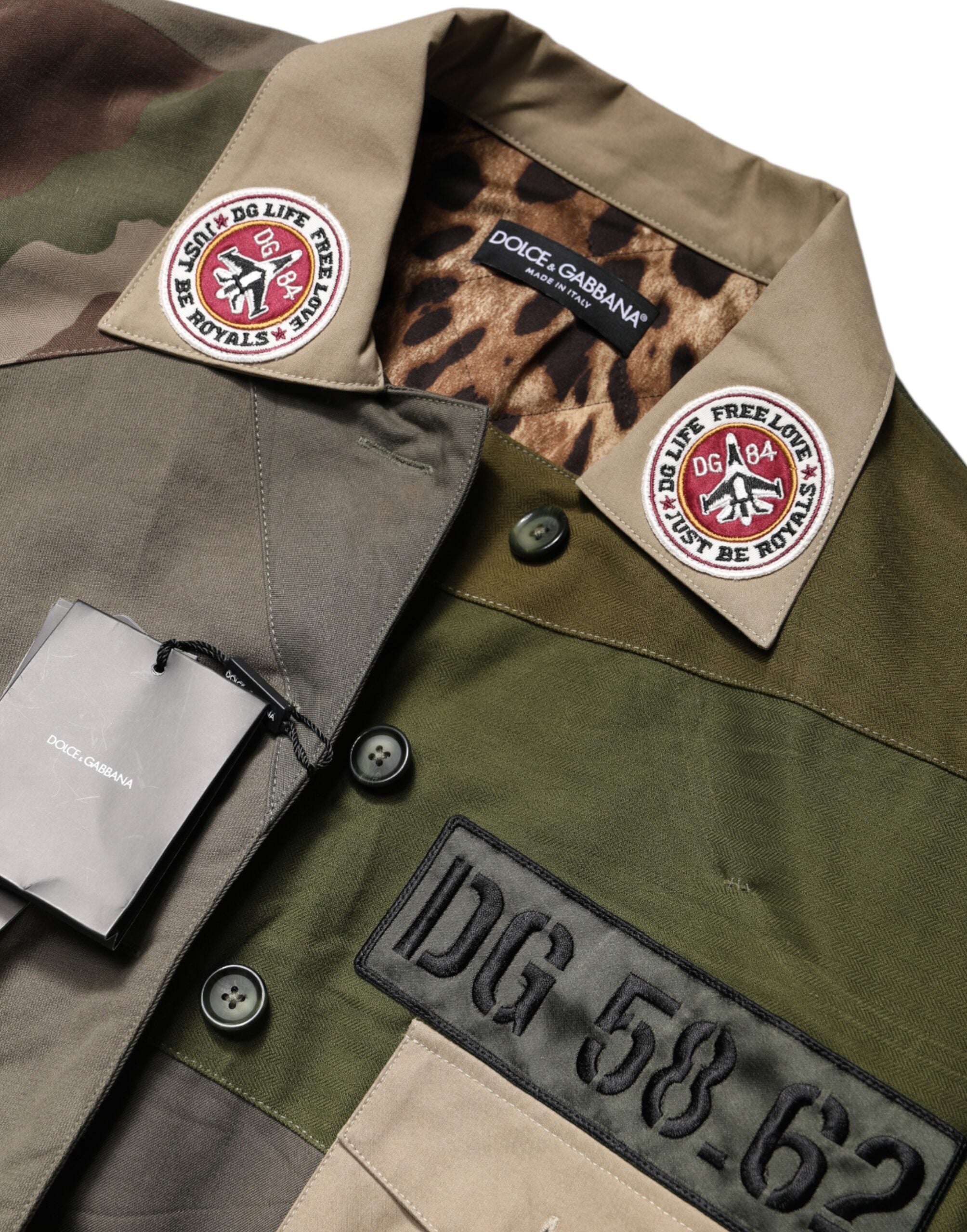 Indulge in the Dolce & Gabbana Military Green Cotton Button Down Jacket, a masterpiece of Italian craftsmanship that embodies timeless luxury and sophisticated allure.