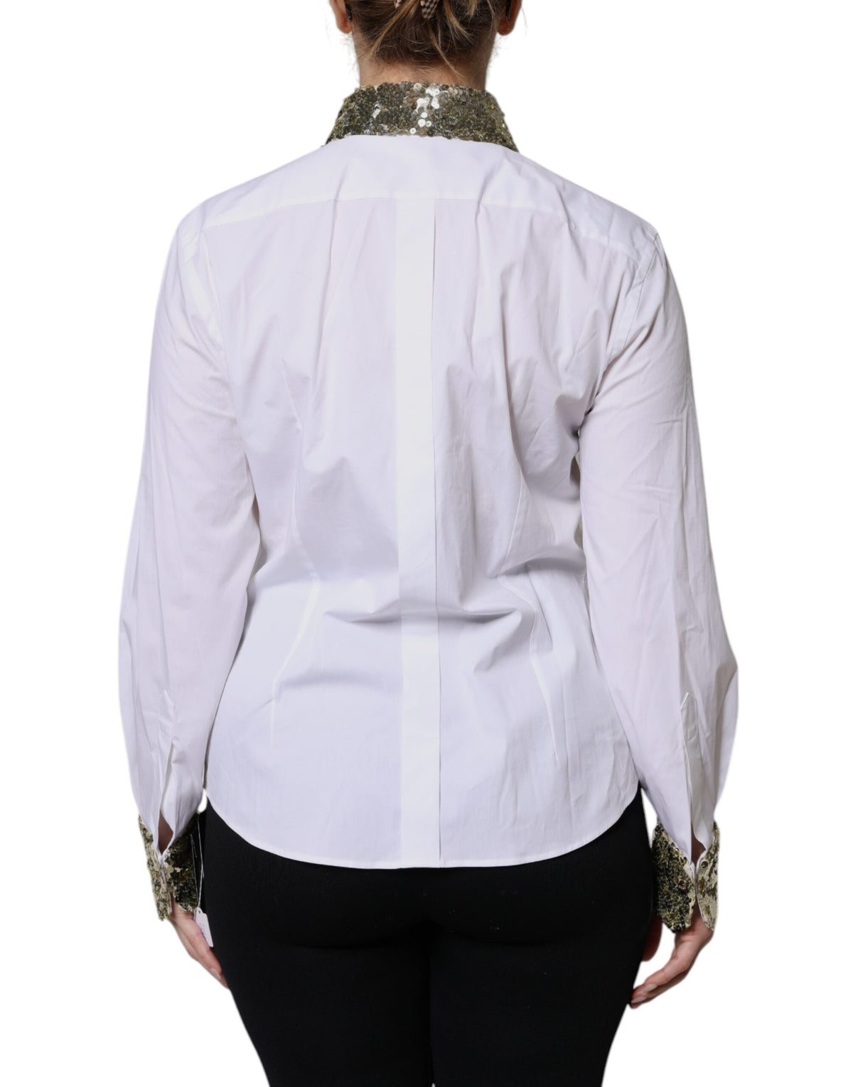 Indulge in the exquisite Dolce & Gabbana White Cotton Long Sleeves Sequin Shirt Top, where luxurious craftsmanship meets timeless elegance for the discerning individual.