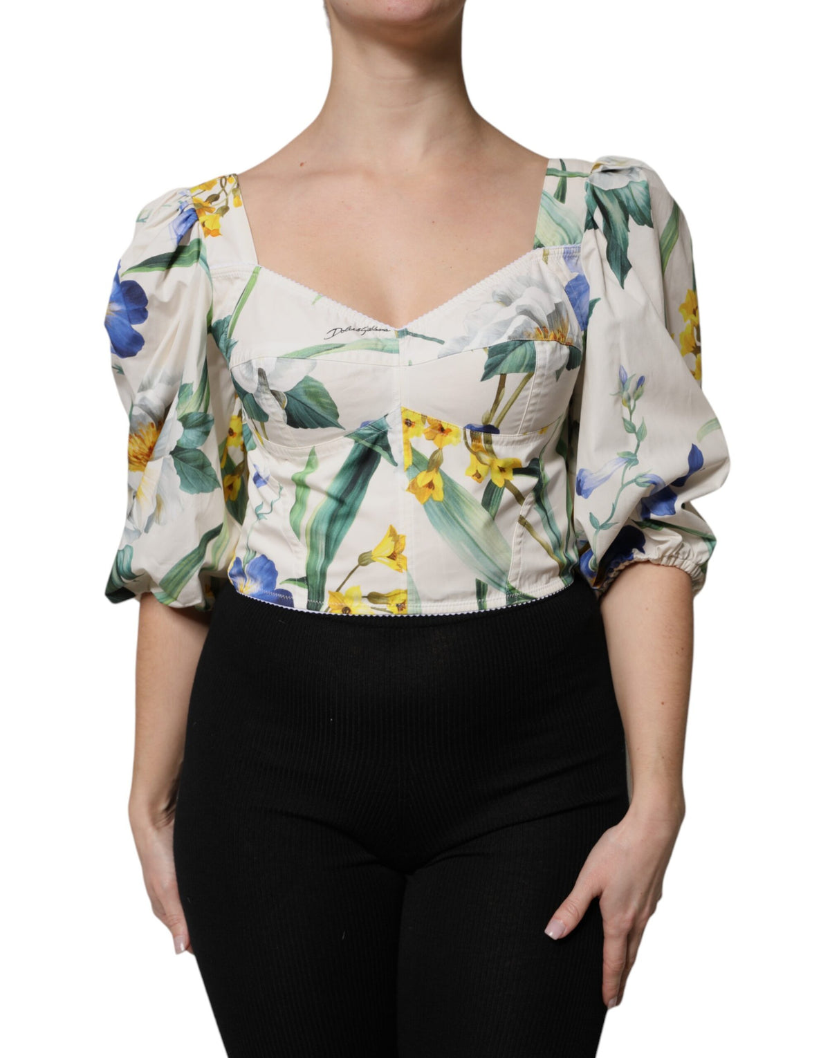 Indulge in the exquisite Dolce & Gabbana White Floral Puff Sleeves Crop Blouse Top, crafted from 100% cotton, a luxurious statement of elegance and refined style.
