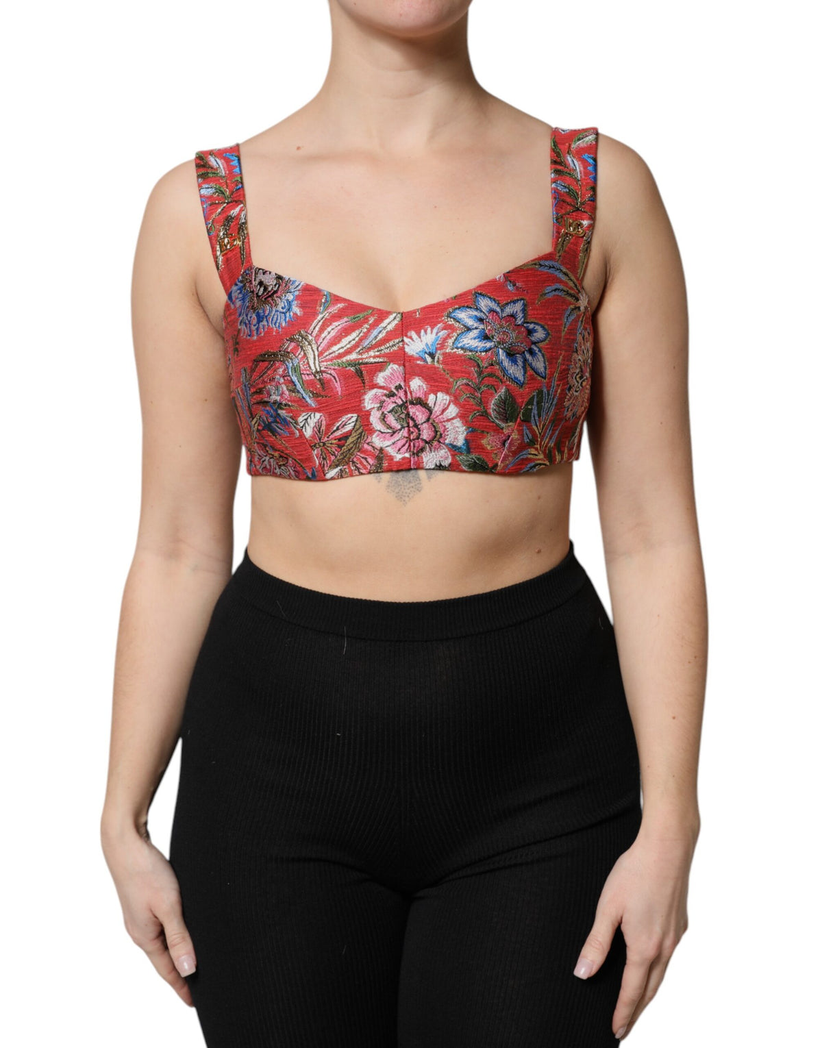 Experience the allure of the Dolce & Gabbana Red Floral Brocade Cropped Bustier Corset Top, a masterpiece of Italian craftsmanship that redefines luxury and sophistication.