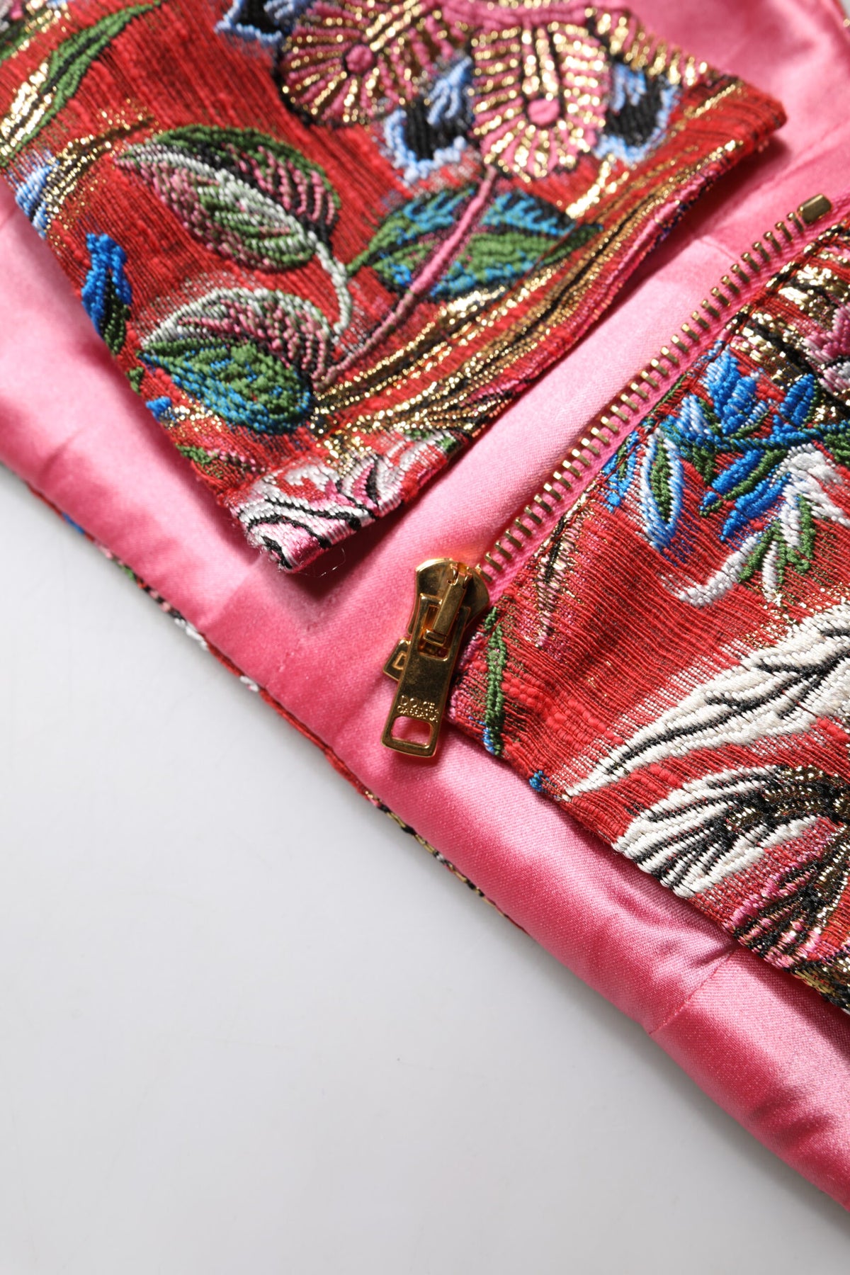 Experience the allure of Dolce & Gabbana's Red Floral Brocade Cropped Bustier Corset Top, a masterpiece of Italian craftsmanship that embodies timeless elegance and sophistication.