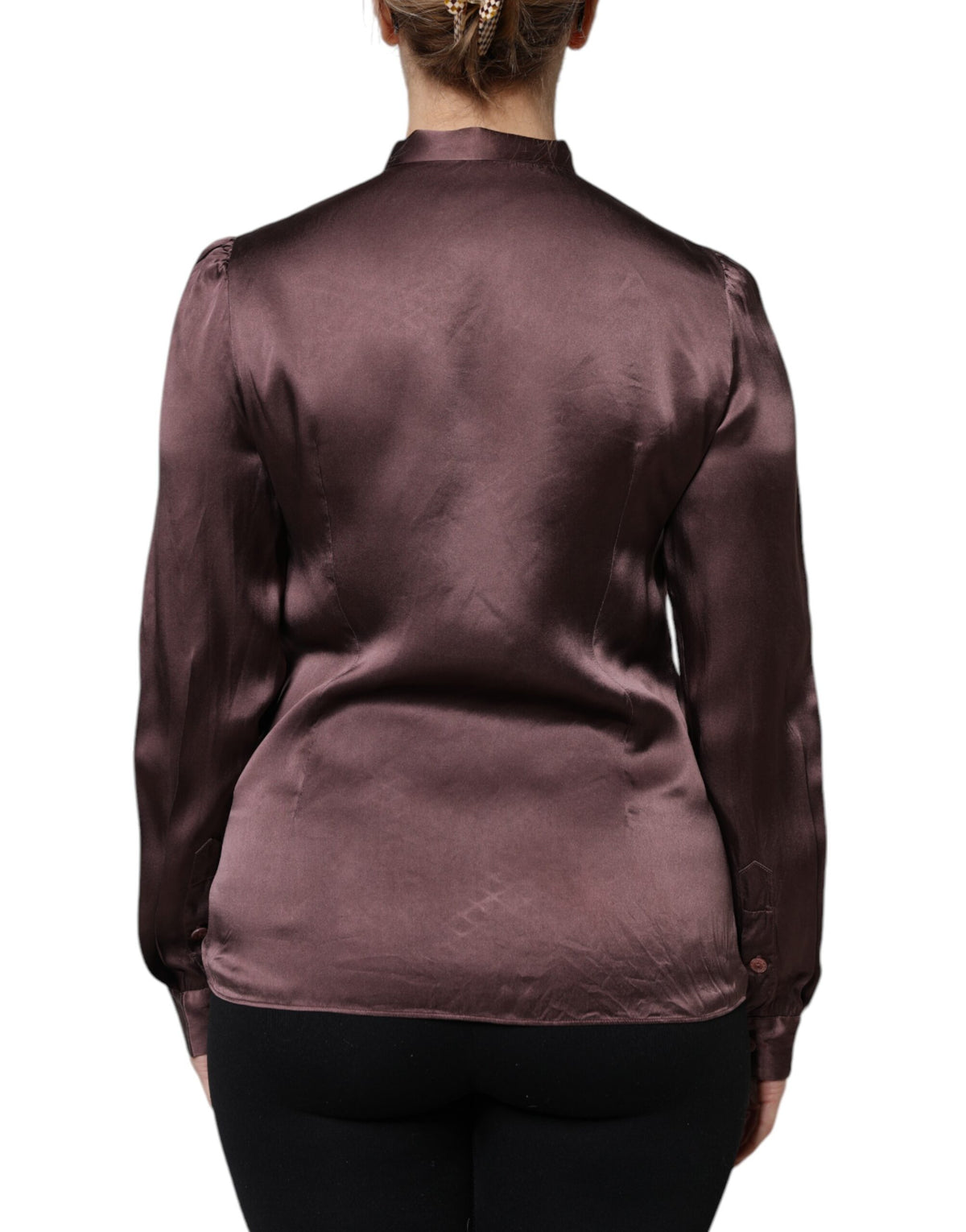Indulge in the exquisite Dolce & Gabbana Brown Ascot Collar Long Sleeve Blouse, a silk masterpiece that embodies Italian craftsmanship and timeless elegance for the discerning individual.