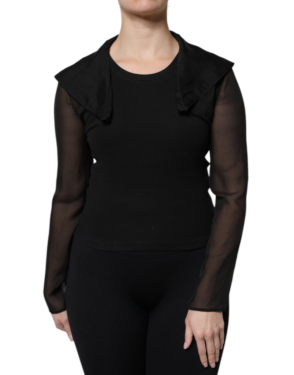 Discover the Dolce & Gabbana Black Silk Sheer Long Sleeves Blouse Top, a masterpiece of Italian craftsmanship that exudes timeless elegance and luxurious allure.