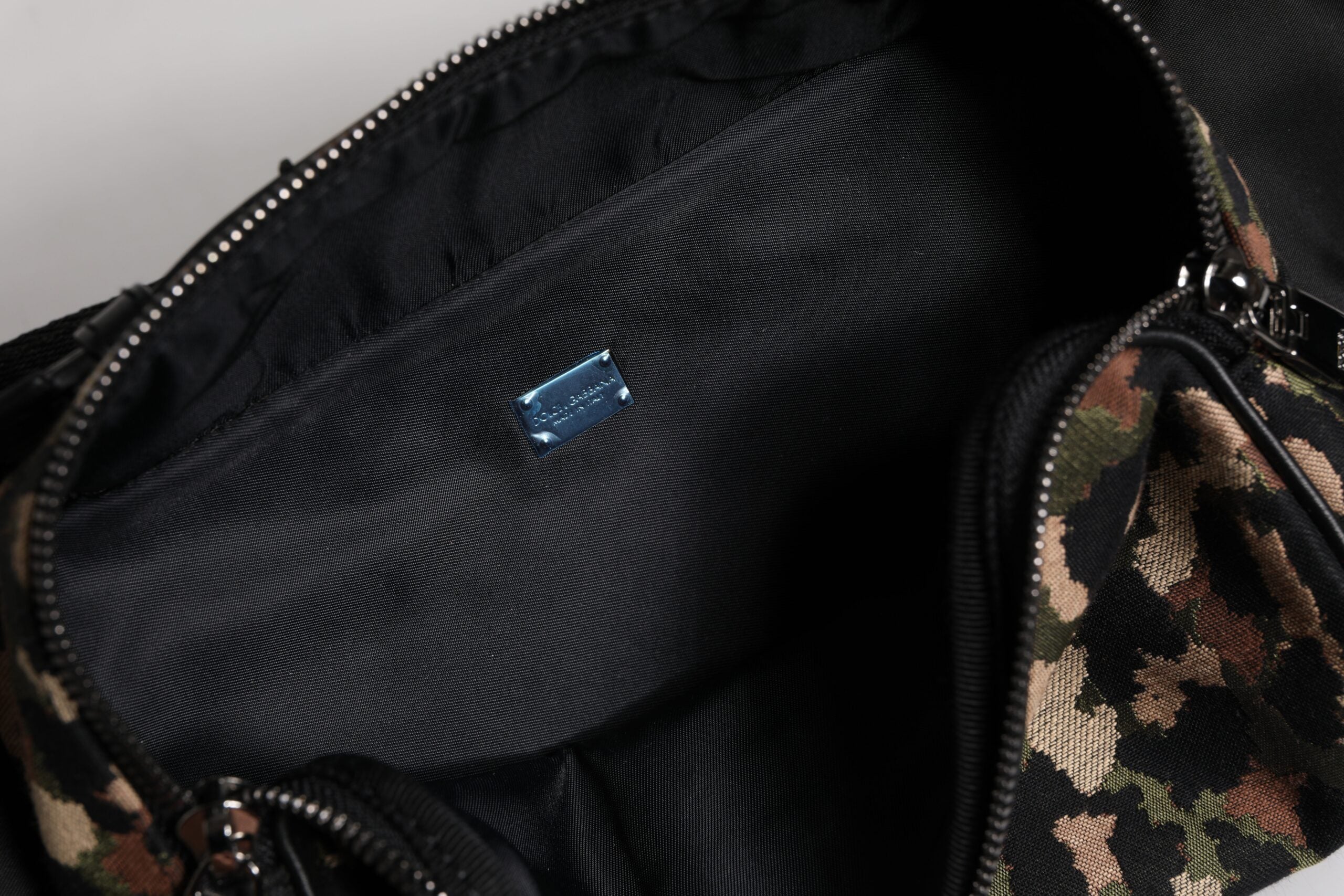 Indulge in the exquisite Dolce & Gabbana Multicolor Leopard DG Logo Belt Waist Fanny Pack Bag, a luxurious statement crafted in Italy, merging bold design with refined materials for the discerning individual.
