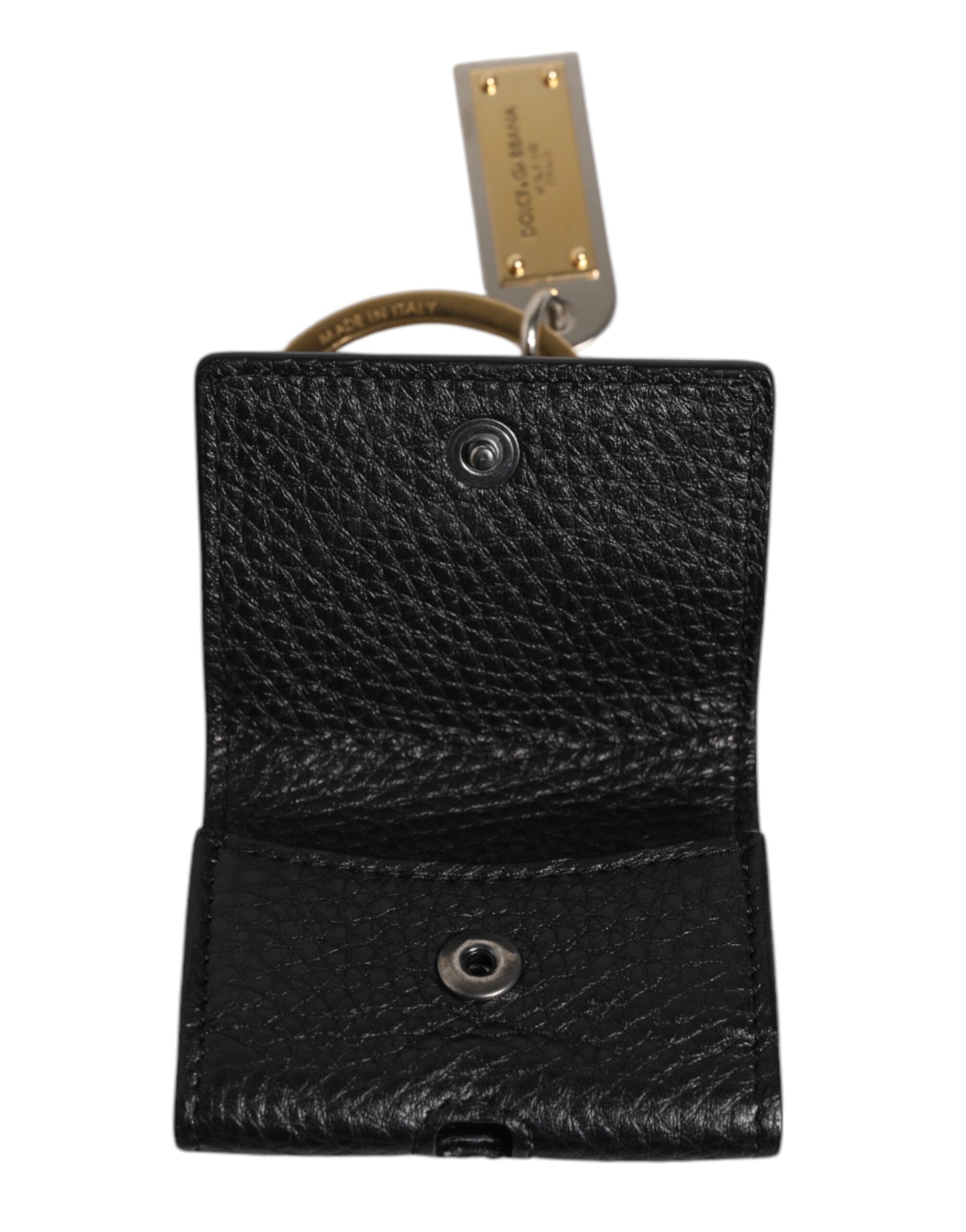 Elevate your style with the Dolce & Gabbana Black Leather Strap Airpods Case, a masterpiece of Italian craftsmanship that embodies luxury and sophistication.