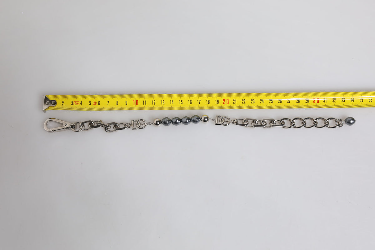 Indulge in the exquisite Dolce & Gabbana Silver Tone Chain Lobster Clasp Logo Gray Pearls Bracelet, a timeless statement of luxury and elegance, perfect for any occasion.