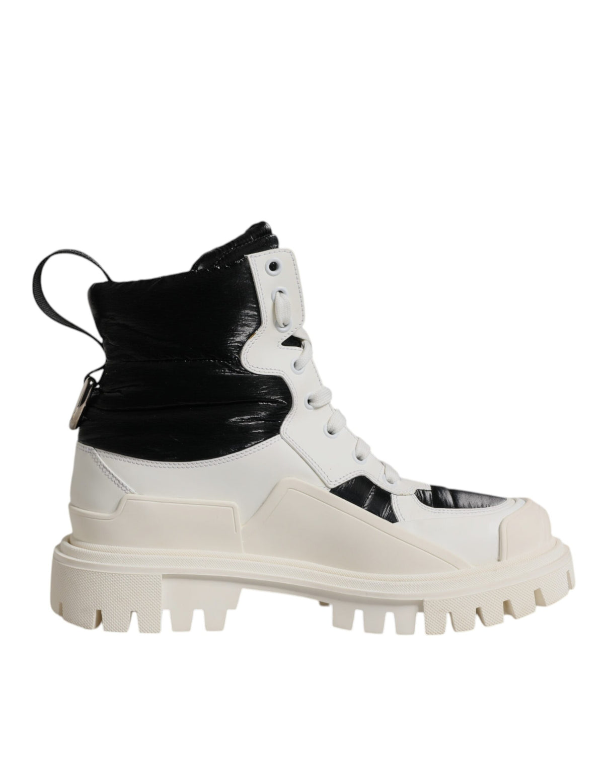 Step into luxury with Dolce & Gabbana's White Padded Mid Calf Lace Up Boots, crafted from premium materials in Italy, embodying timeless elegance and sophisticated allure.