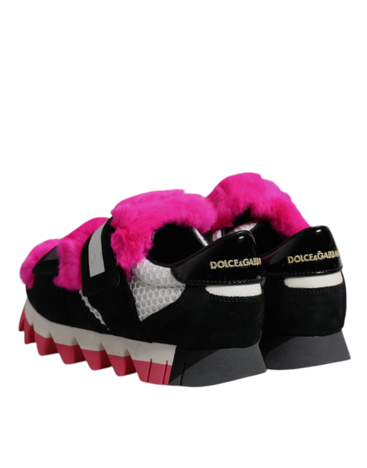 Indulge in the exquisite Dolce & Gabbana Black Pink Fur Embellished Sneakers, where artisanal luxury meets sophisticated allure, elevating your style with unparalleled elegance.