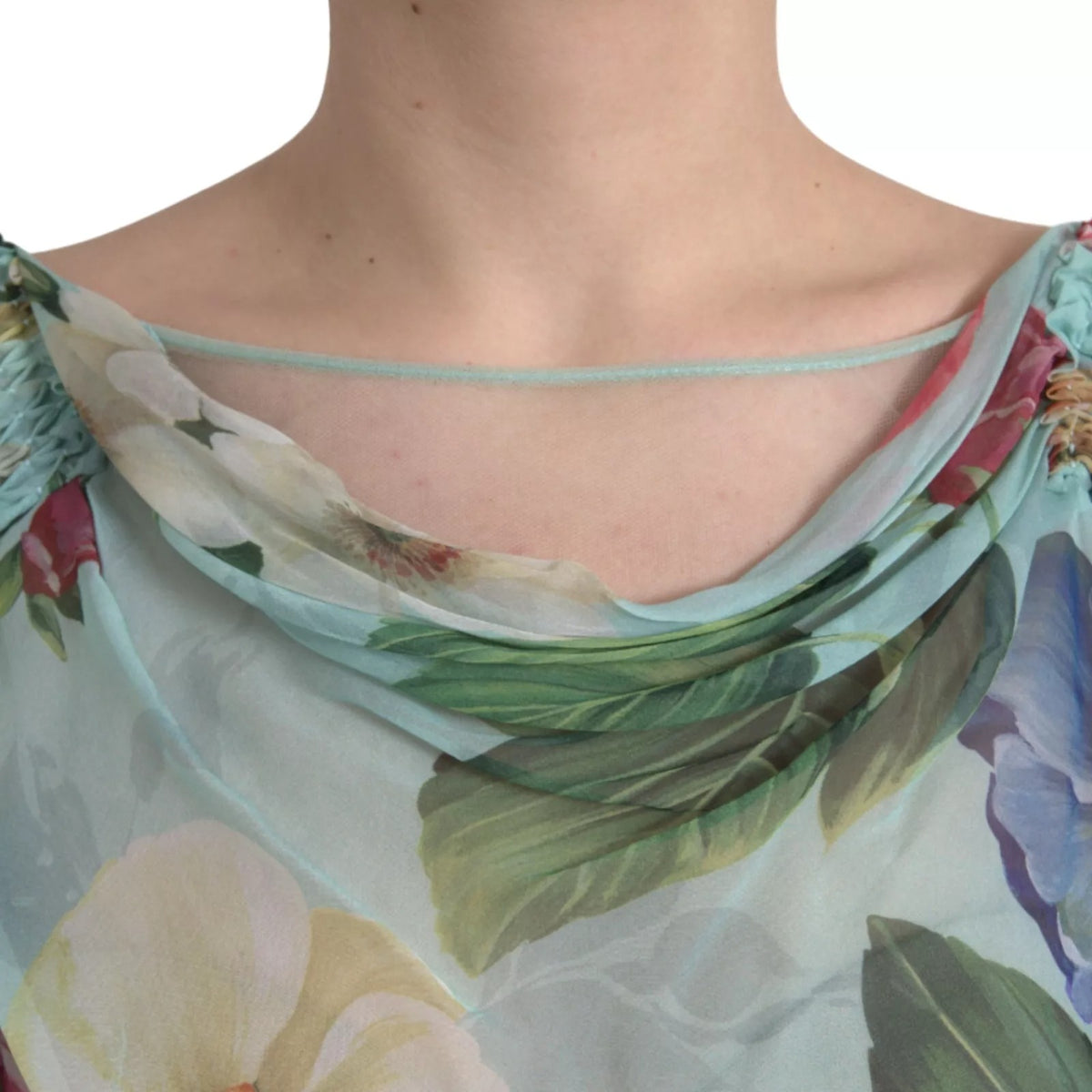 Indulge in the exquisite Dolce & Gabbana Blue Floral Print Tiered Long Maxi Dress, a silk masterpiece that embodies timeless elegance and sophisticated allure for any occasion.