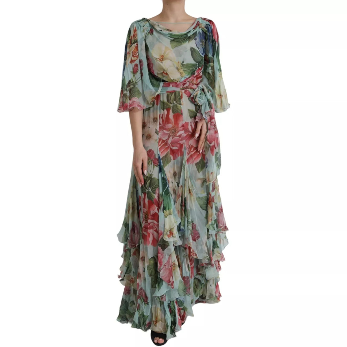 Indulge in the exquisite allure of the Dolce & Gabbana Blue Floral Print Tiered Long Maxi Dress, a silk masterpiece that embodies timeless elegance and sophisticated charm.