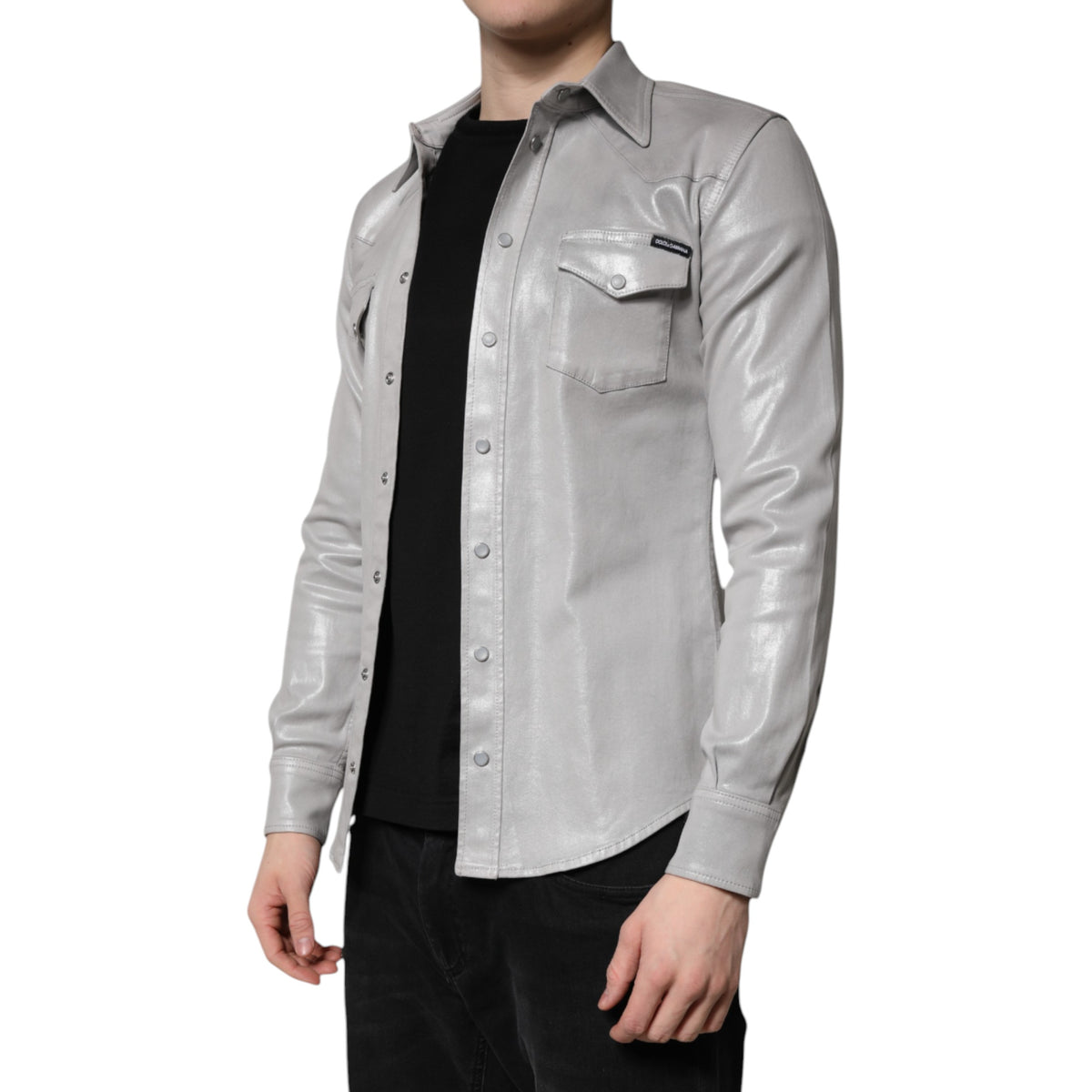 Elevate your wardrobe with the Dolce & Gabbana Metallic Gray Cotton Button Down Shirt, a masterpiece of Italian craftsmanship blending luxury and elegance for the discerning individual.