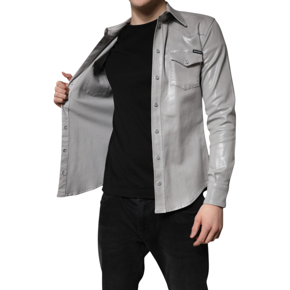 Indulge in the exquisite craftsmanship of the Dolce & Gabbana Metallic Gray Cotton Button Down Shirt, a luxurious blend of comfort and elegance, perfect for every sophisticated occasion.
