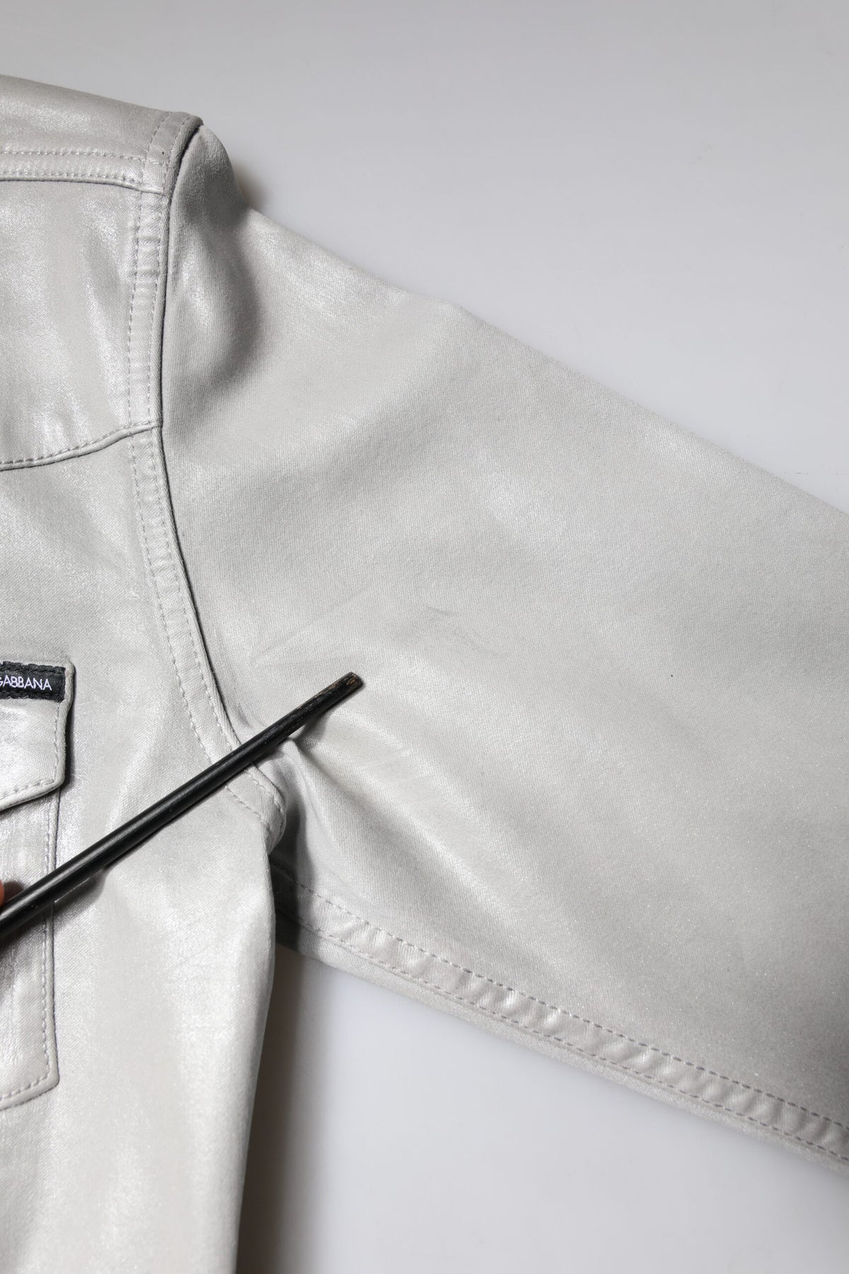 Discover the Dolce & Gabbana Metallic Gray Cotton Button Down Shirt, a luxurious blend of cotton and elastane, embodying refined elegance and timeless sophistication.
