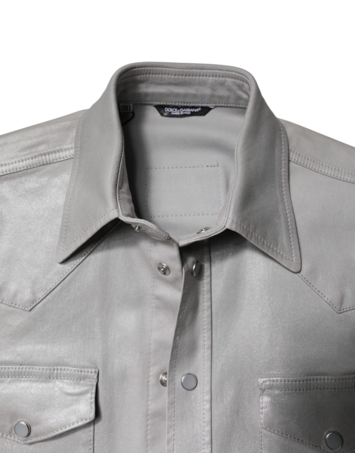 Experience the exquisite allure of Dolce & Gabbana's Metallic Gray Cotton Button Down Shirt, a testament to Italian craftsmanship that elevates your wardrobe with timeless elegance.