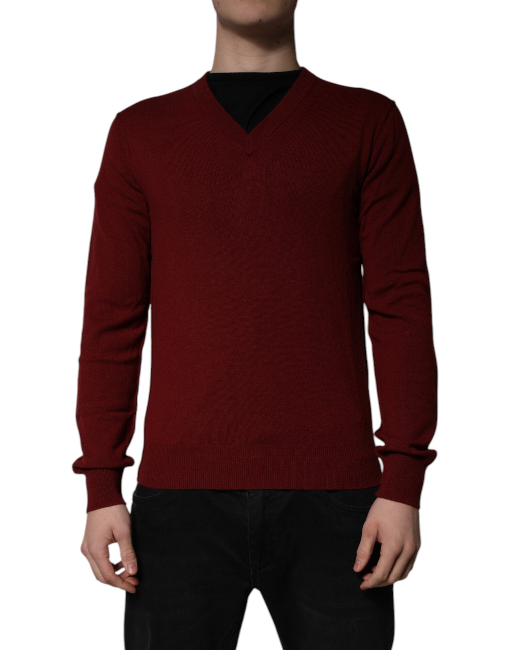 Indulge in the exquisite Dolce & Gabbana Maroon Cashmere V-neck Pullover Sweater, a timeless piece of luxury crafted from the finest cashmere, embodying sophistication and elegance.