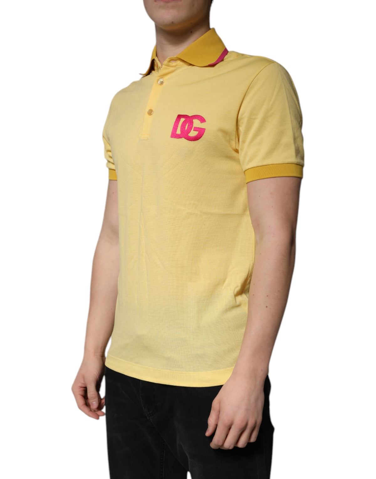 Indulge in the exquisite Dolce & Gabbana Yellow Cotton Logo Collared Polo T-shirt, a testament to Italian craftsmanship and vibrant luxury, perfect for the discerning individual.