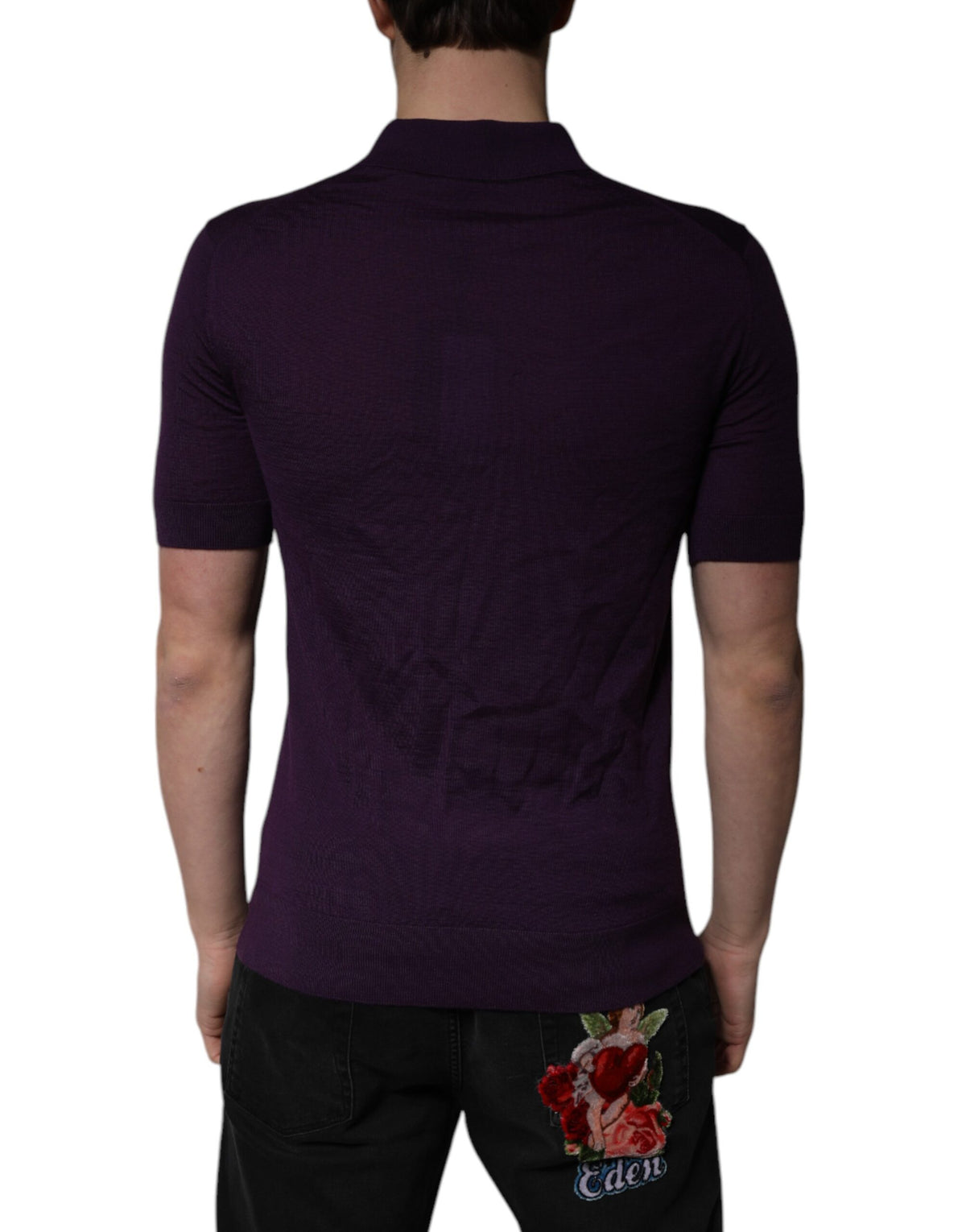 Indulge in the exquisite Dolce & Gabbana Violet Cashmere Collared Polo T-shirt, a timeless piece of Italian craftsmanship that embodies luxury and sophistication for the discerning individual.