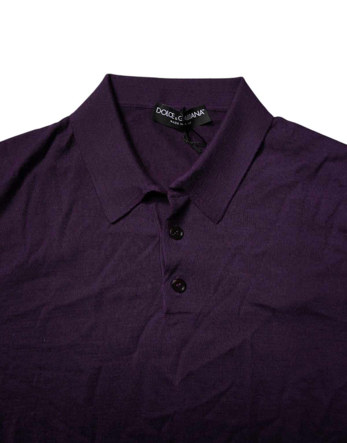 Indulge in the exquisite Dolce & Gabbana Violet Cashmere Collared Polo T-shirt, a masterpiece of Italian craftsmanship that embodies timeless luxury and sophisticated allure.