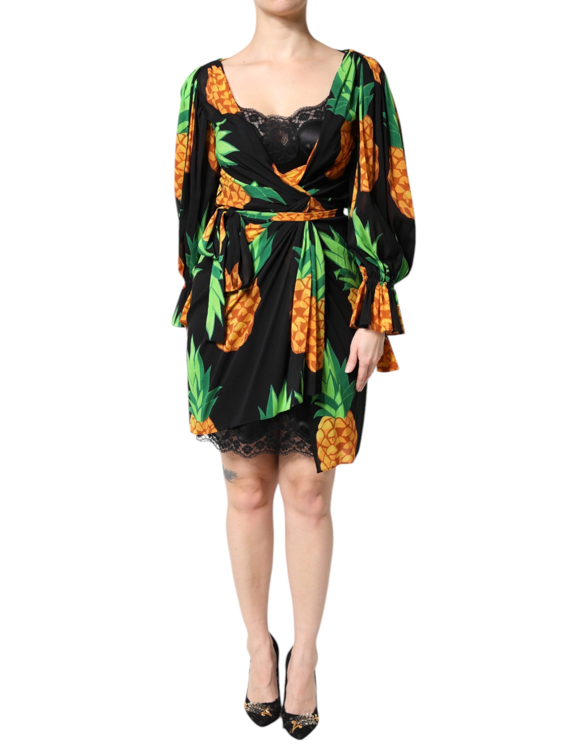 Elevate your wardrobe with the Dolce & Gabbana Black Silk Pineapple Draped Print Wrap Dress, a masterpiece of Italian craftsmanship that embodies luxury and allure.
