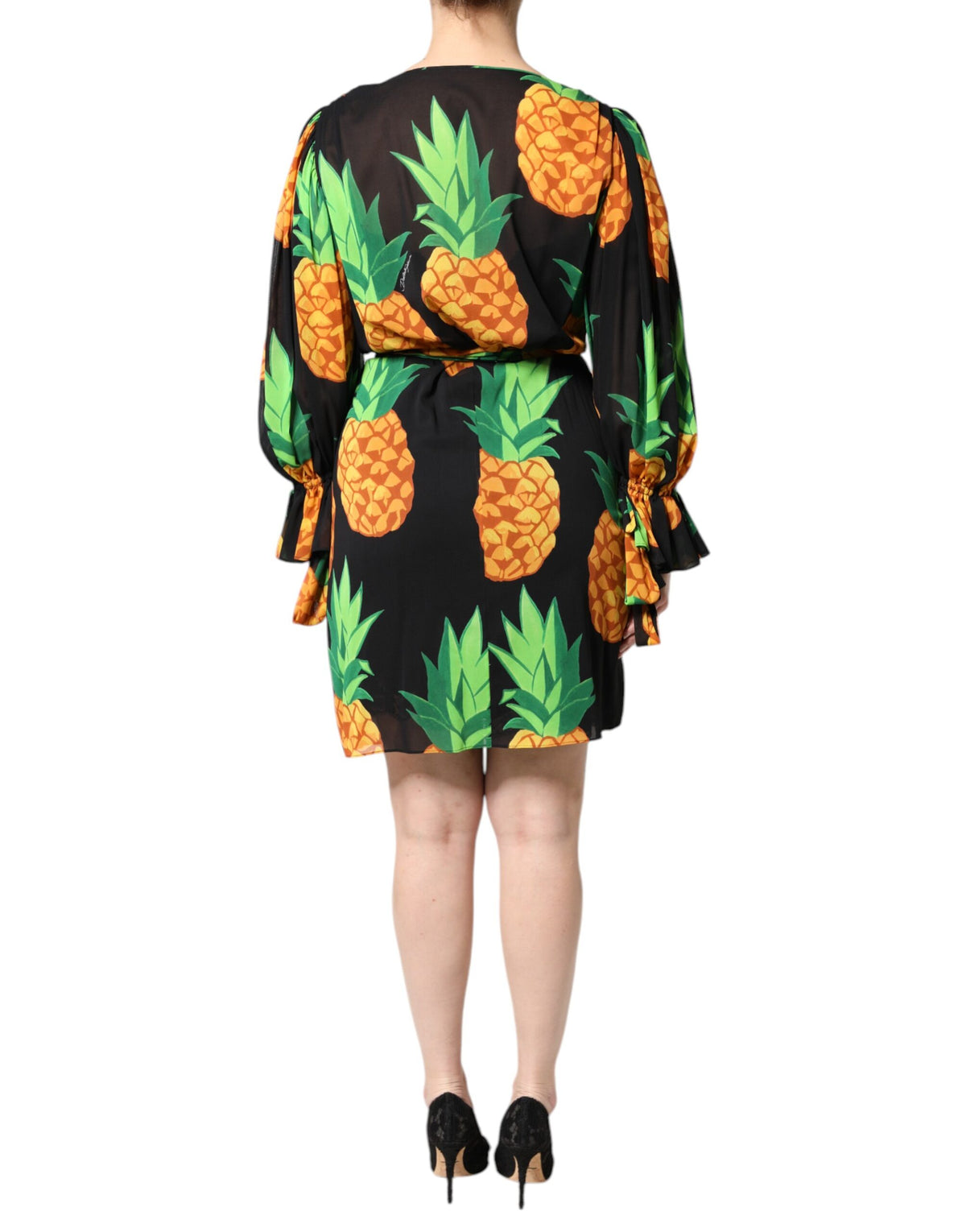 Experience the allure of Dolce & Gabbana's Black Silk Pineapple Draped Print Wrap Dress, where exquisite silk meets vibrant artistry, perfect for unforgettable moments.