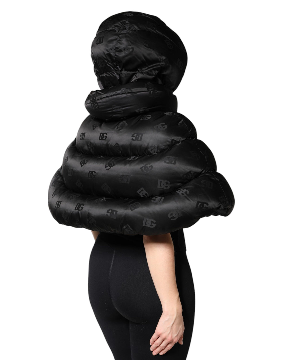 Indulge in the exquisite Dolce & Gabbana Black Padded Puffer Hooded Full Zip Cropped Jacket, crafted from premium nylon, embodying timeless elegance and sophisticated allure.