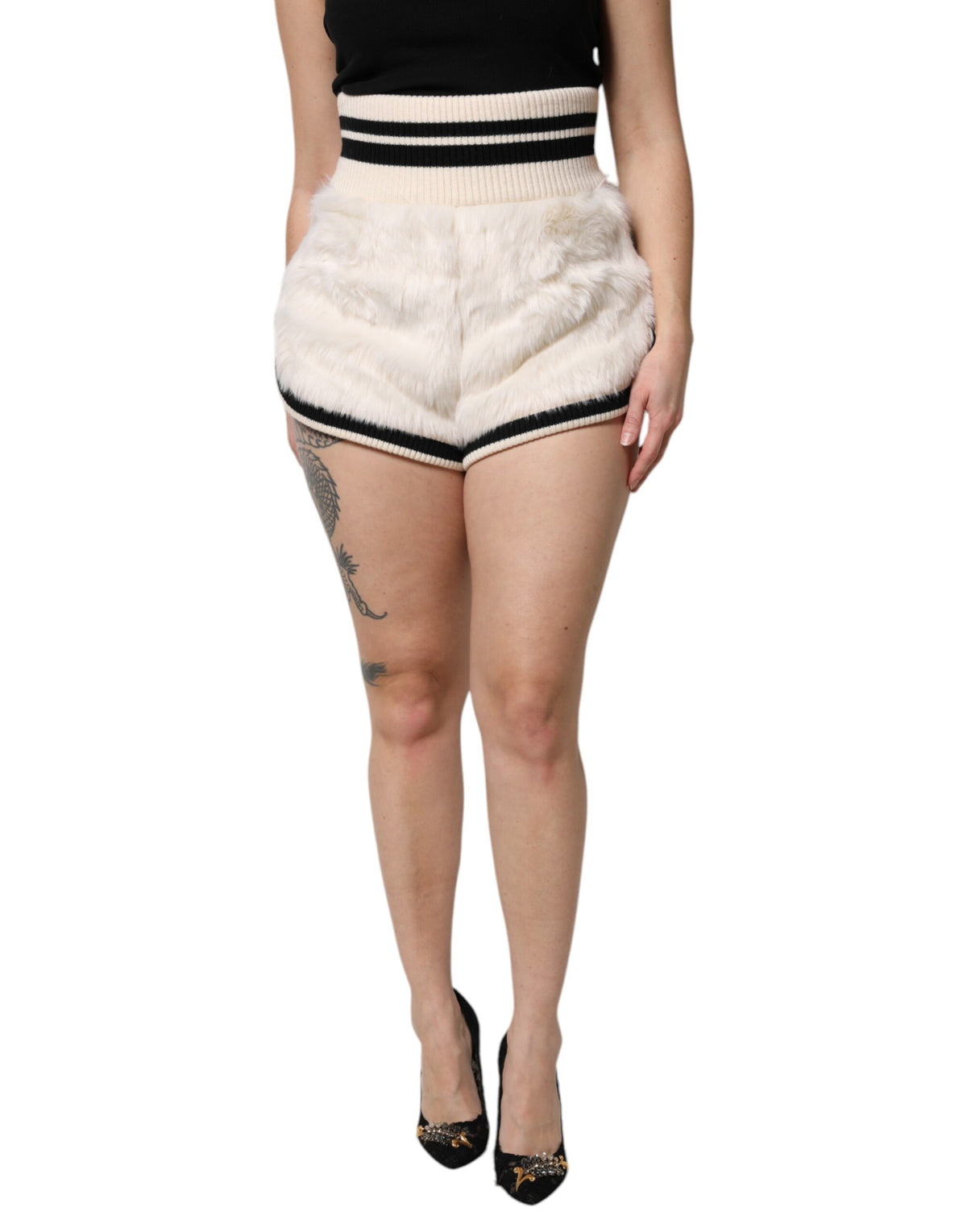 Discover the allure of Dolce & Gabbana's White Faux Fur High Waisted Hot Pants, crafted from luxurious materials for a timeless, sophisticated statement in haute couture fashion.