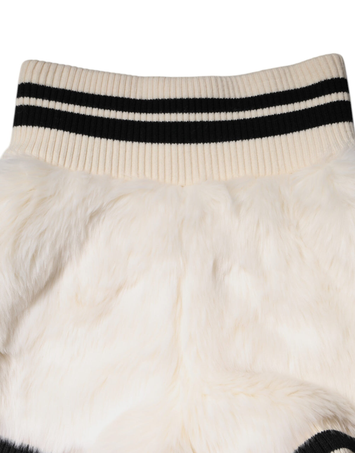 Indulge in the exquisite Dolce & Gabbana White Faux Fur High Waisted Hot Pants, a luxurious blend of acrylic and silk that redefines sophistication and elegance.