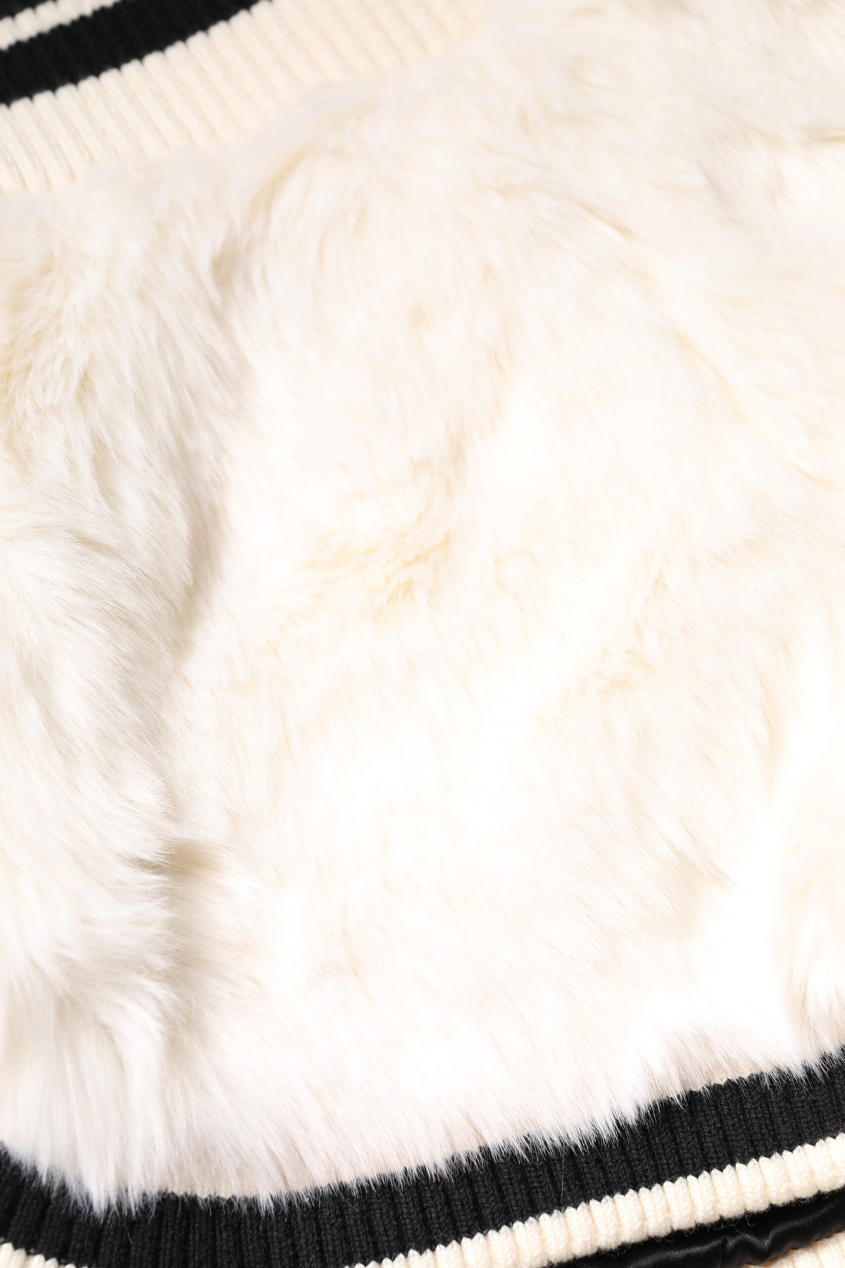 Indulge in the exquisite allure of Dolce & Gabbana's White Faux Fur High Waisted Hot Pants, where luxurious materials and impeccable Italian craftsmanship redefine elegance.