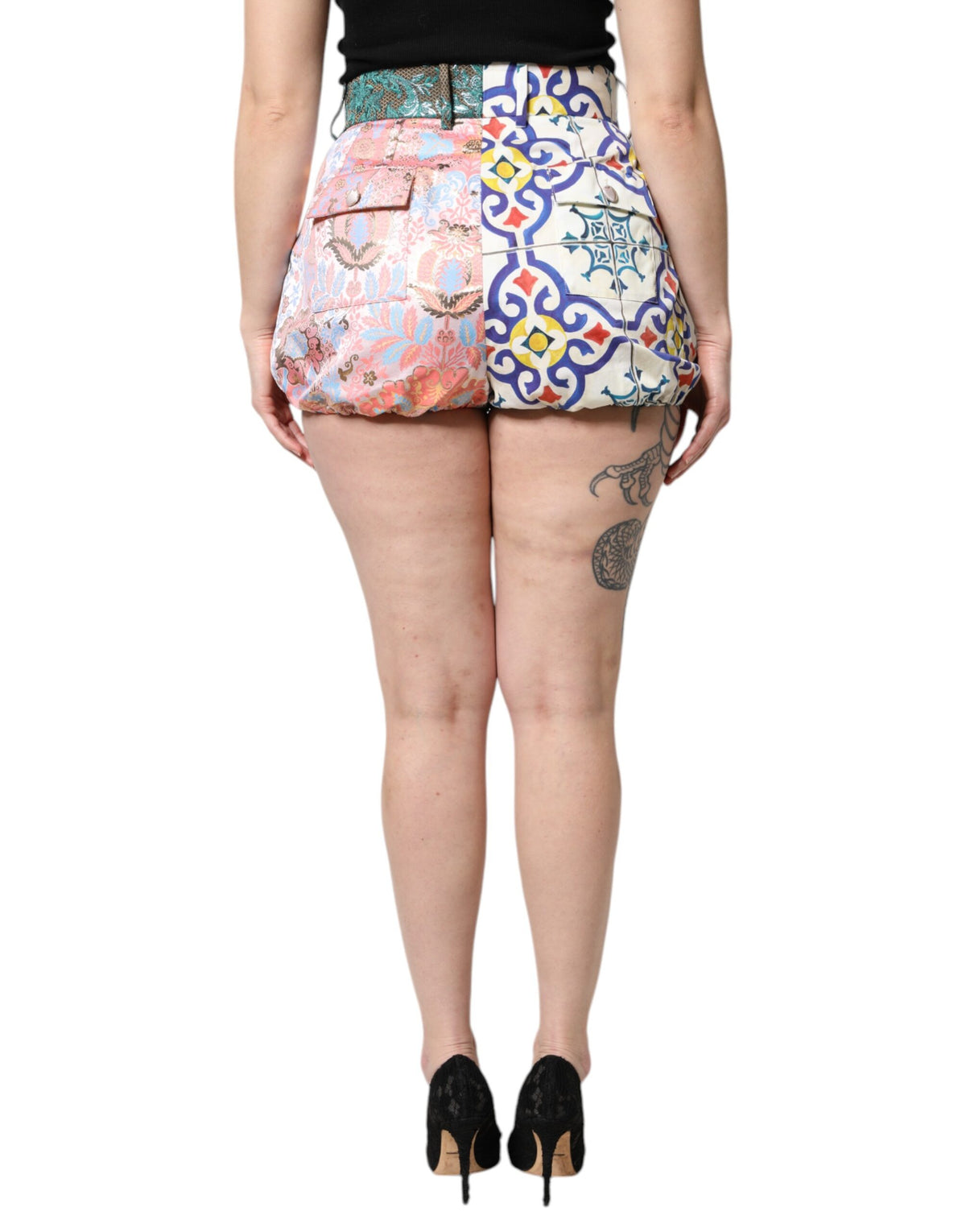 Indulge in the exquisite allure of Dolce & Gabbana's Multicolor Cotton Patchwork Hot Pants, a masterpiece of luxury craftsmanship that elevates your style with vibrant elegance.