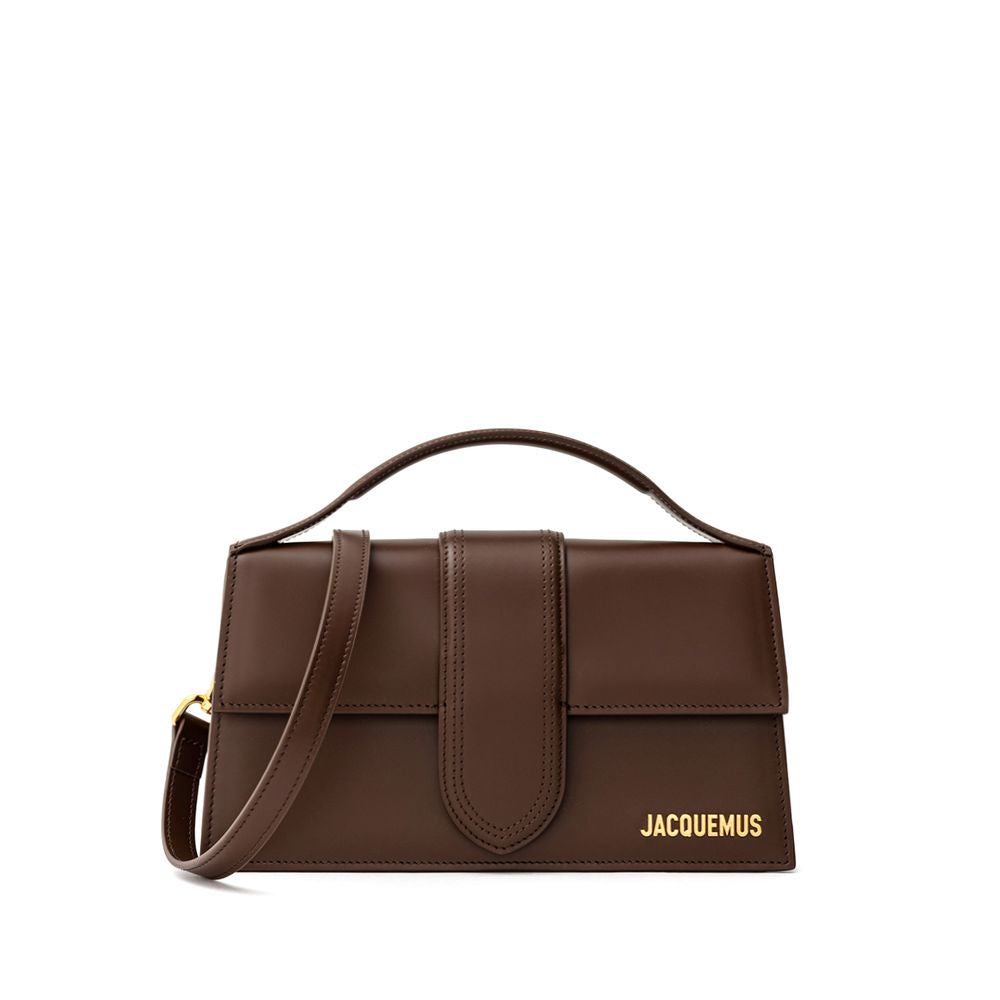 Indulge in the exquisite Jacquemus Brown Leather Handbag, a masterpiece of 100% leather craftsmanship that redefines luxury and sophistication for the discerning individual.